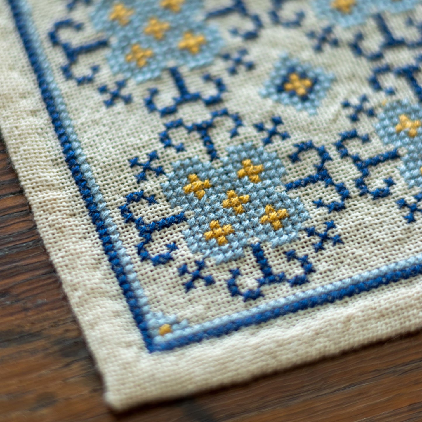 folk embroidery with blue flower design