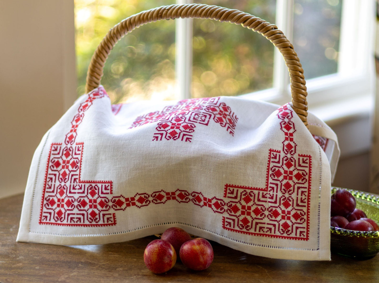 basket cloth with red folk embroidery design