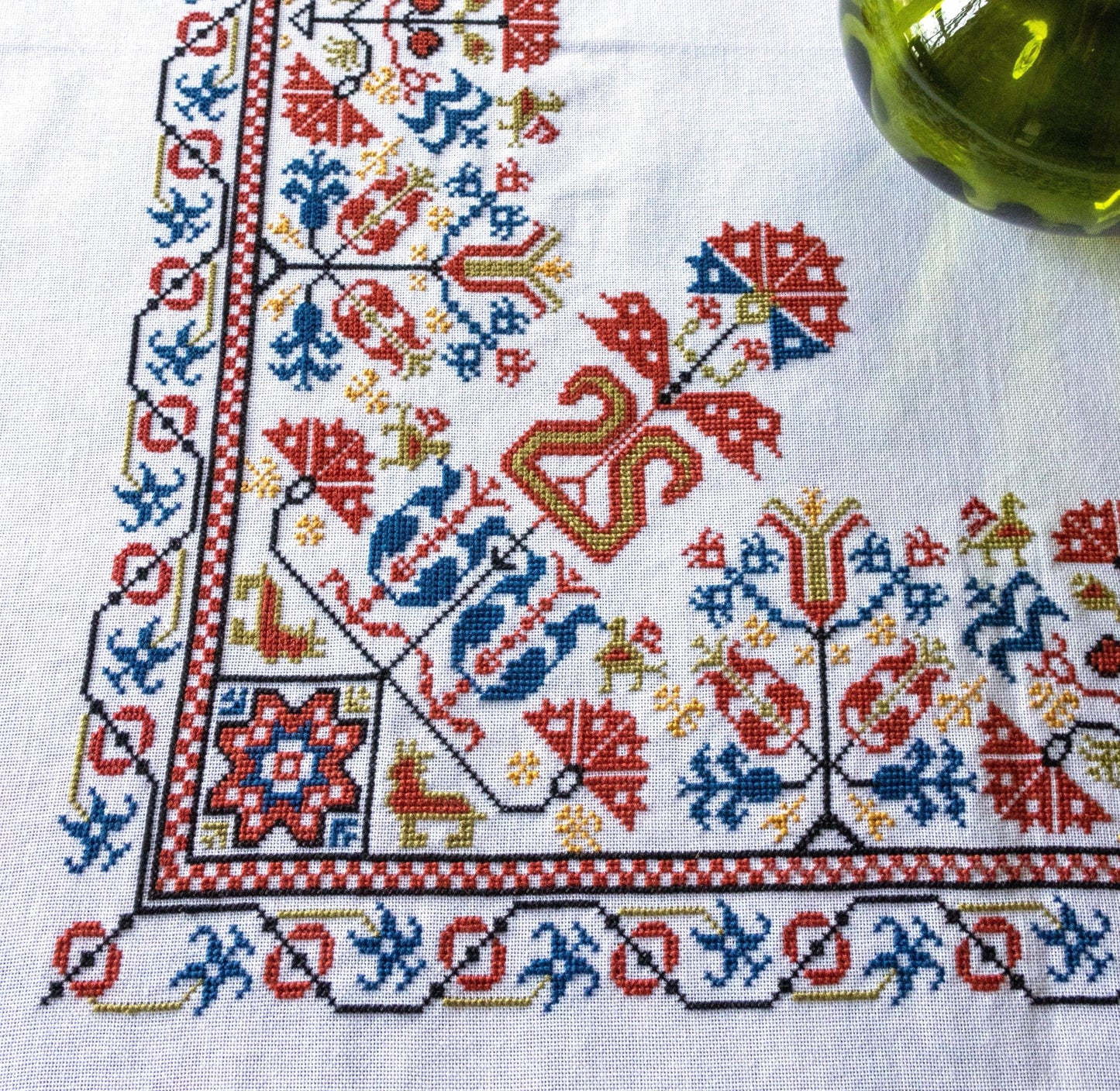 cross stitch folk embroidery with Greek border design