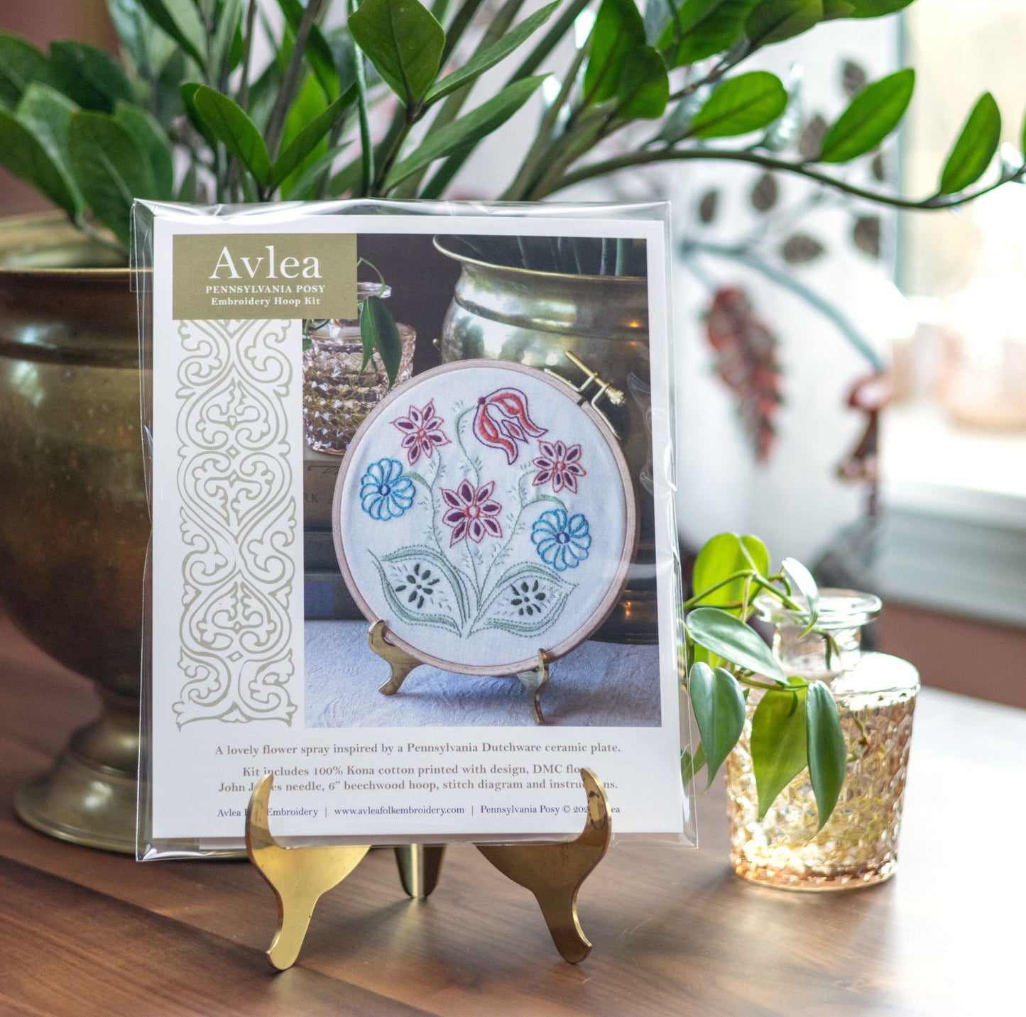 embroidery kit on table with plant