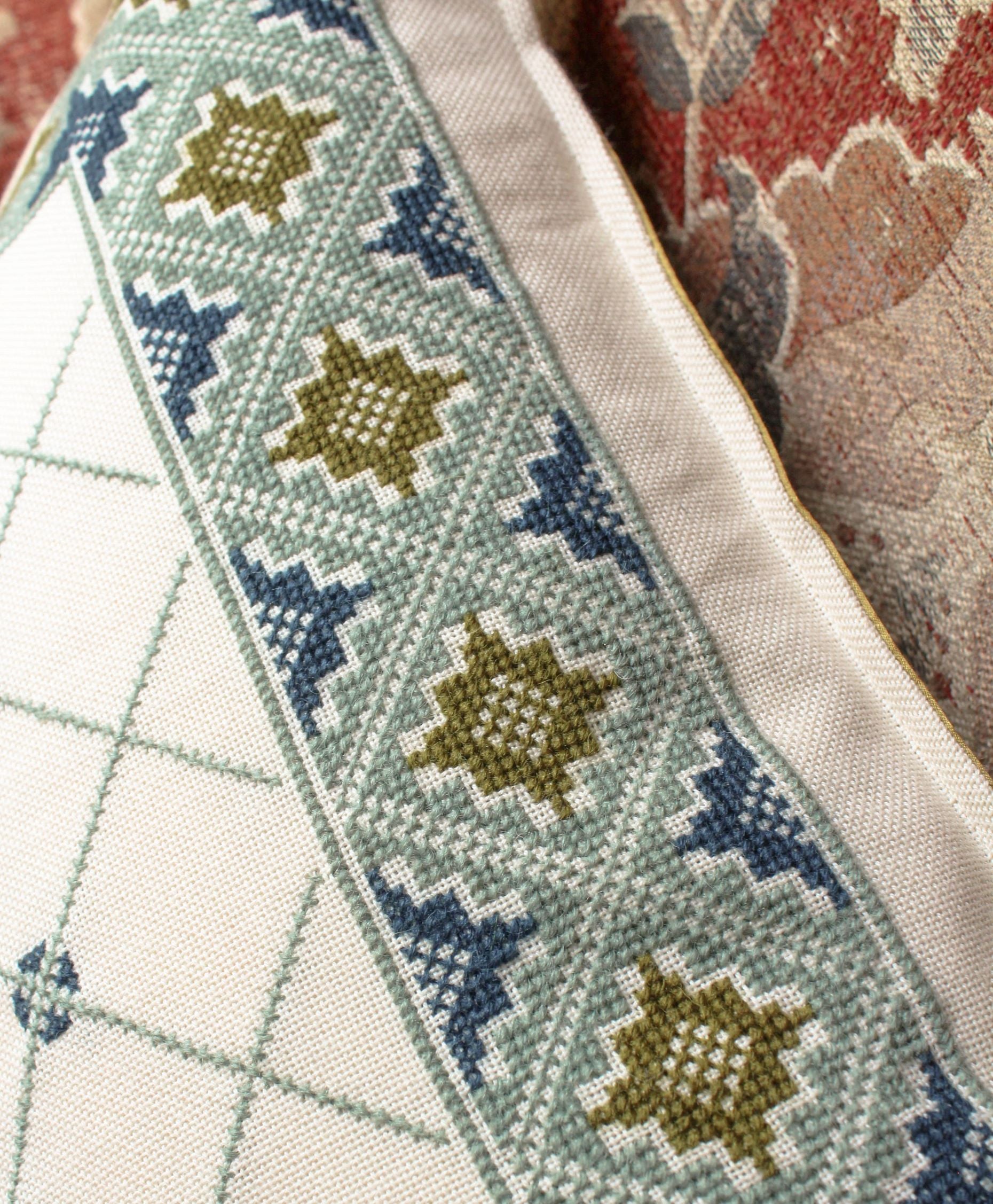 folk embroidery with wool floss in star design