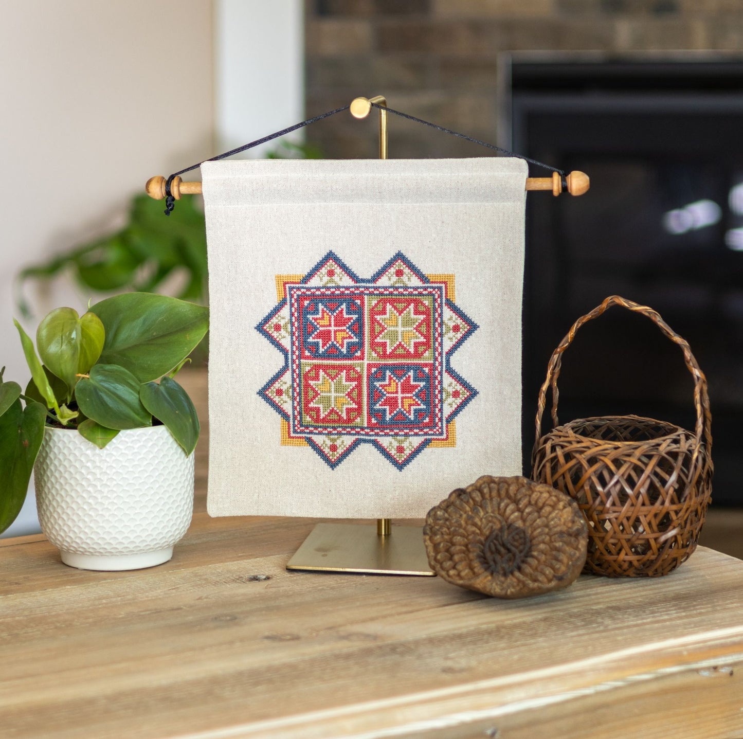 cross stitch embroidery with eight pointed stars inspired by Greek embroidery