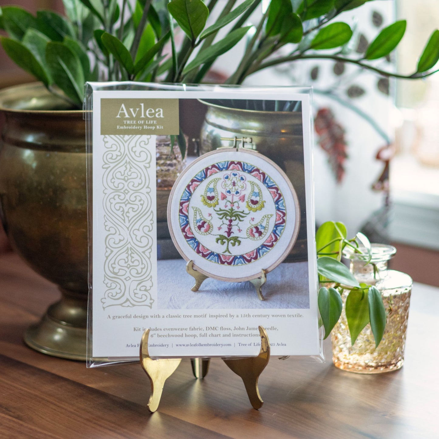 Avlea embroidery hoop kit with a plant and decorative item in the background
