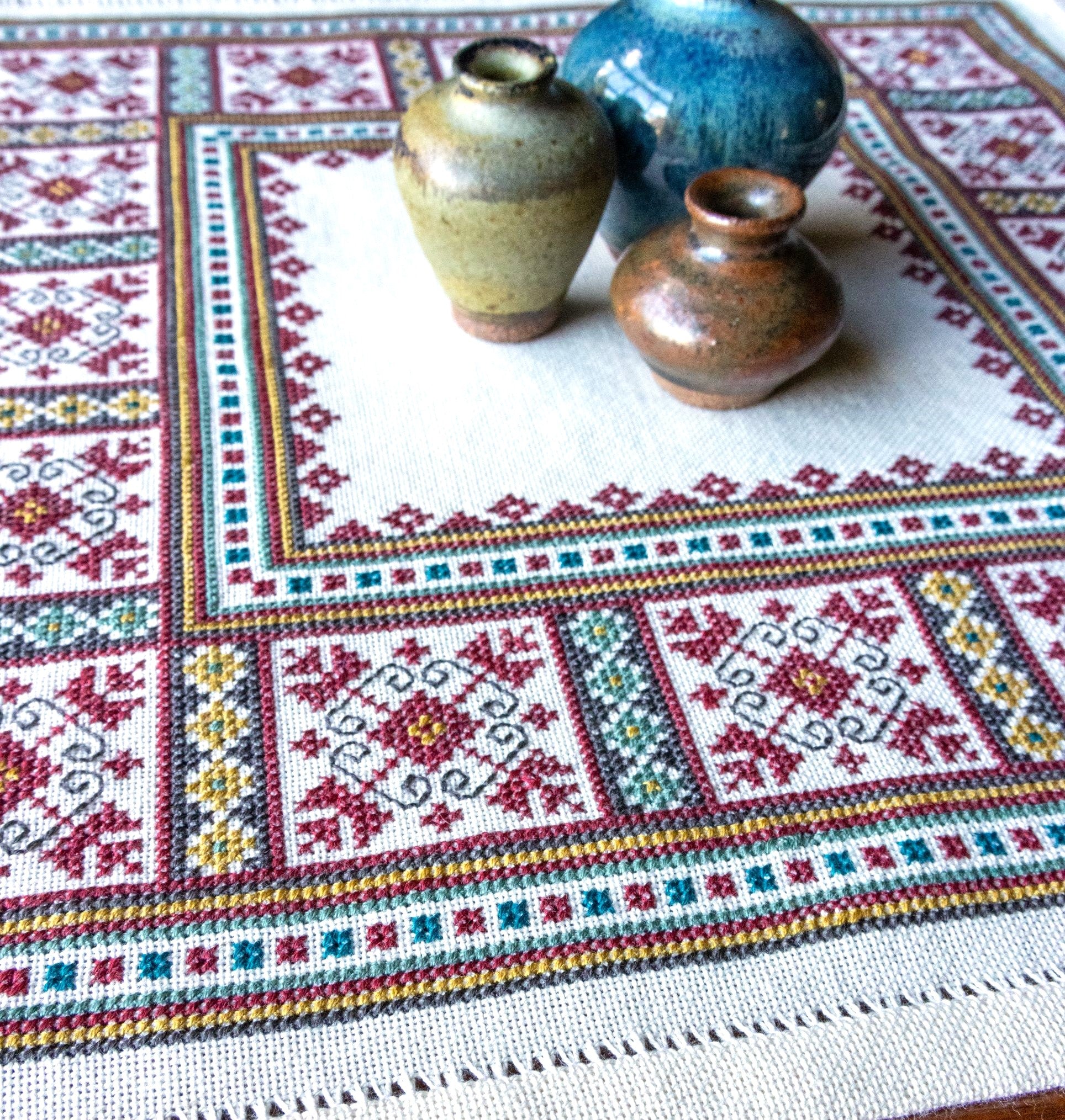 cross stitch folk embroidery with ukrainian tulip design