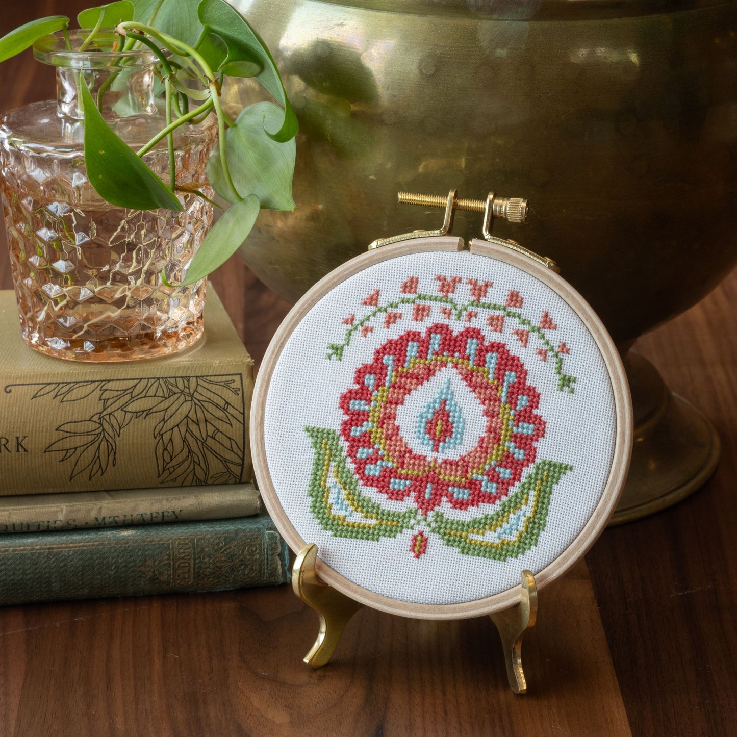 cross stitch folk embroidery flower in hoop