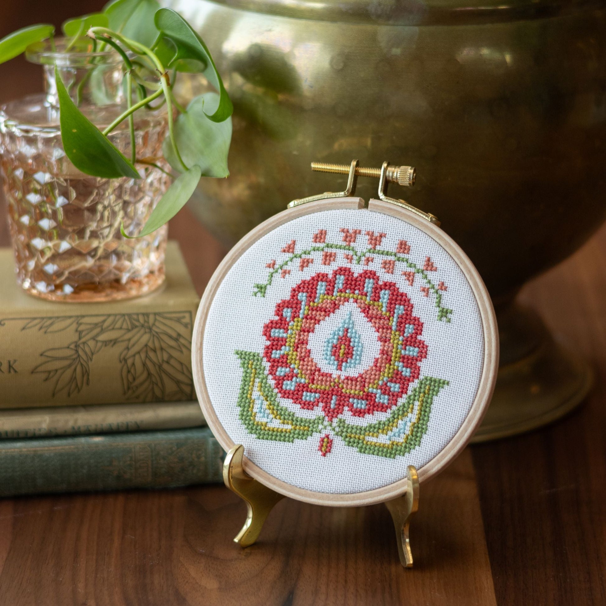 cross stitch folk embroidery flower in hoop