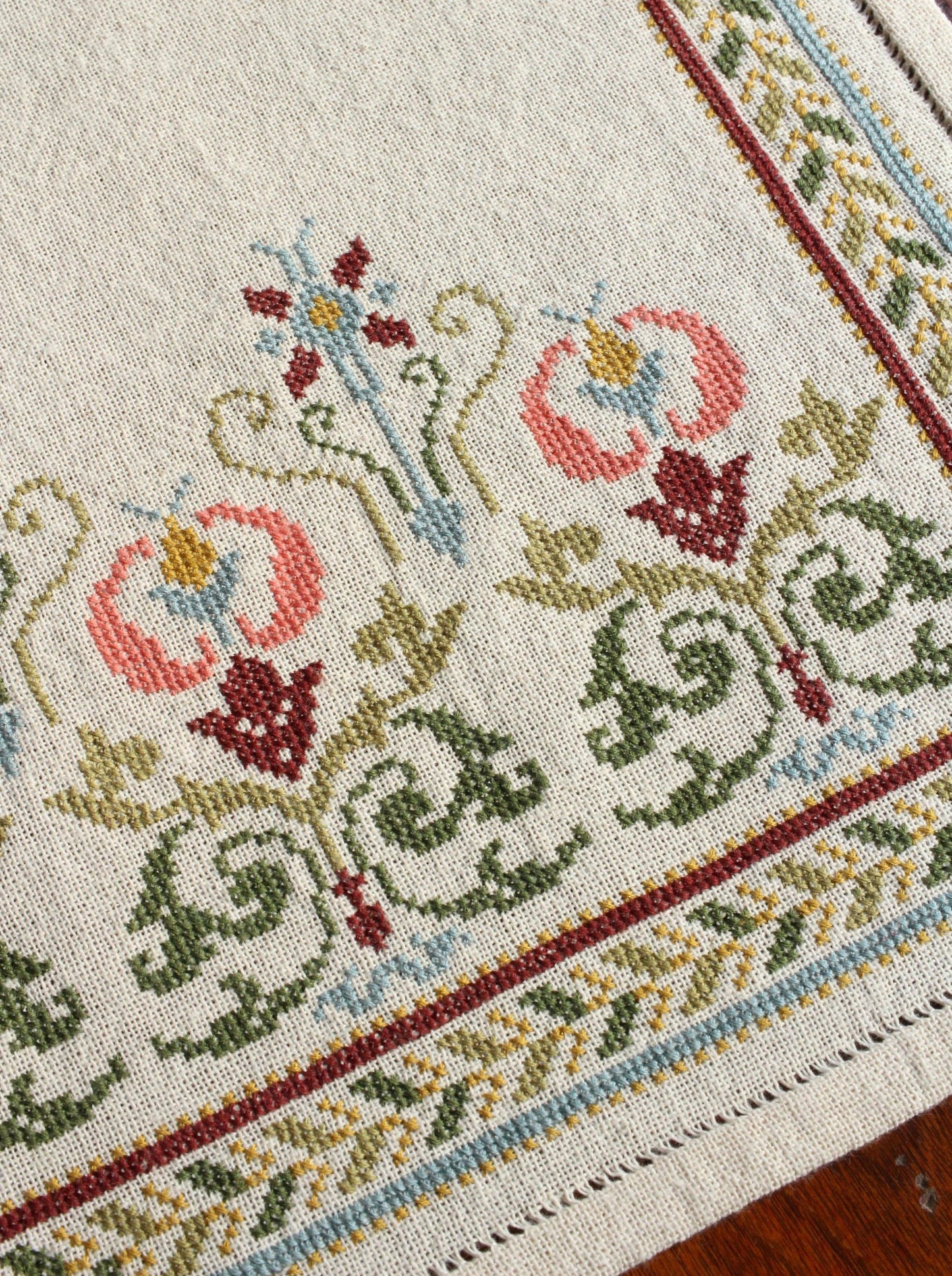 folk embroidery table runner with flowers