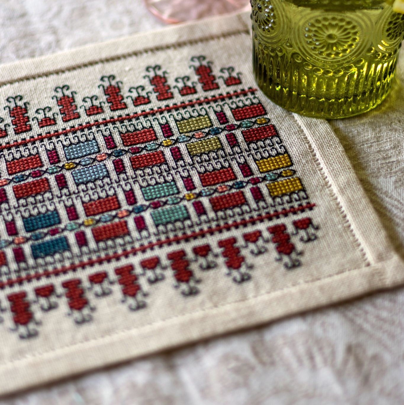 folk embroidery with repeating Greek design