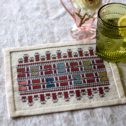 folk embroidery with repeating Greek design