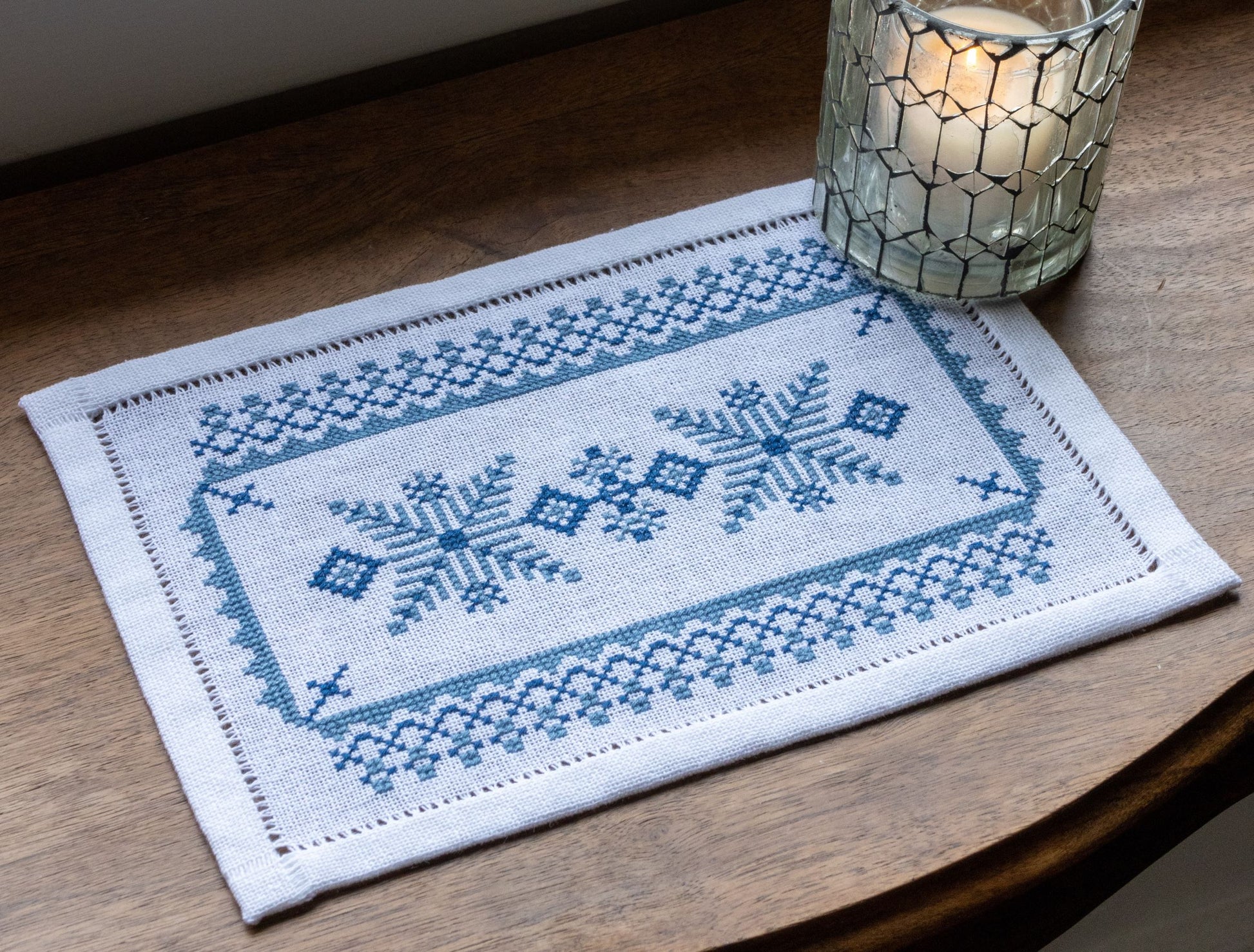 scandinavian folk embroidery design in blue and white