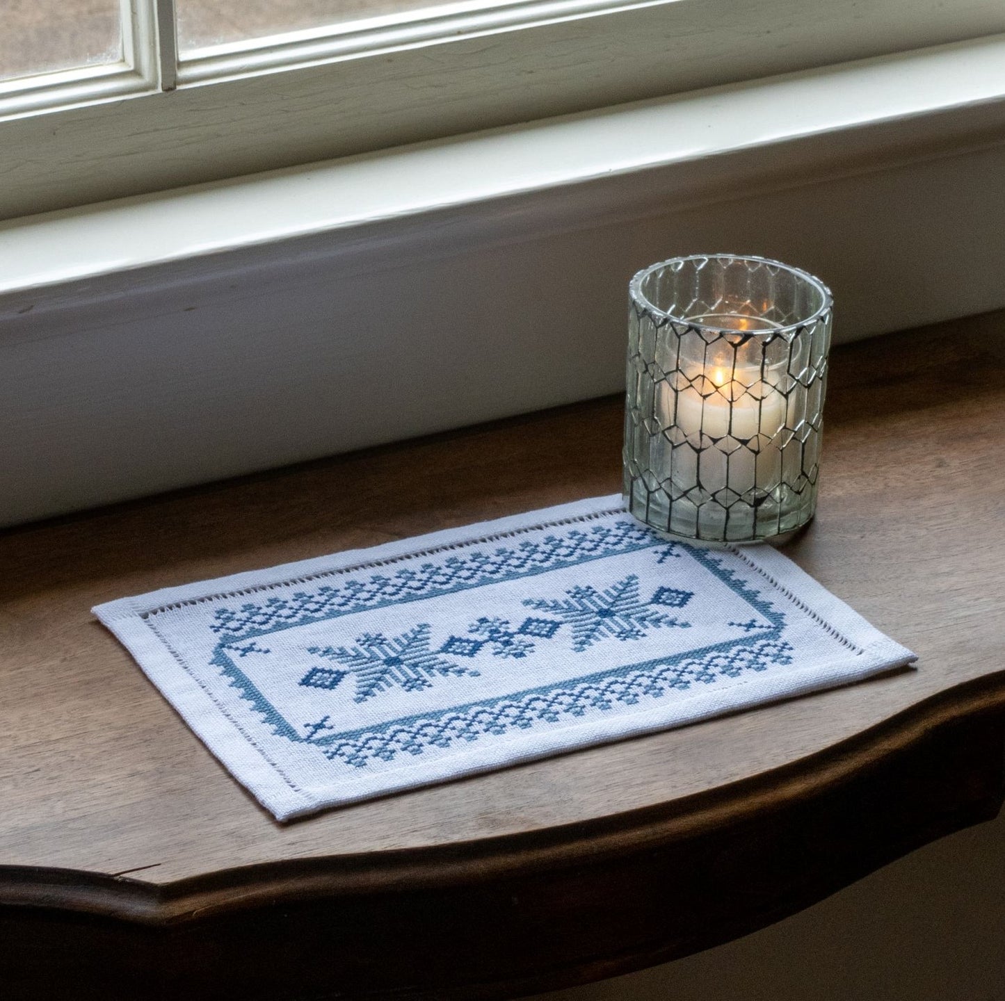 scandinavian folk embroidery design in blue and white