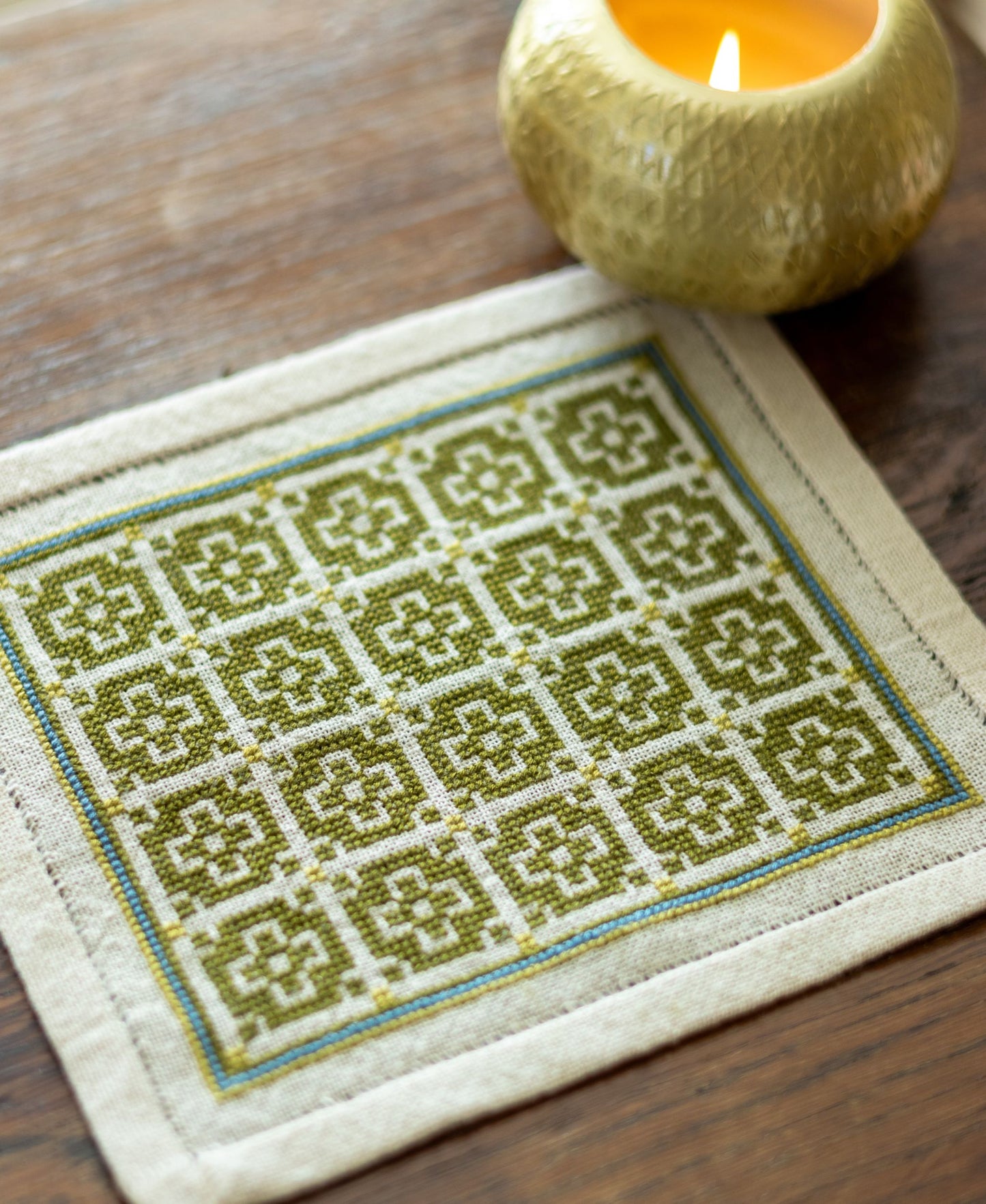 folk embroidery with green mosaic design