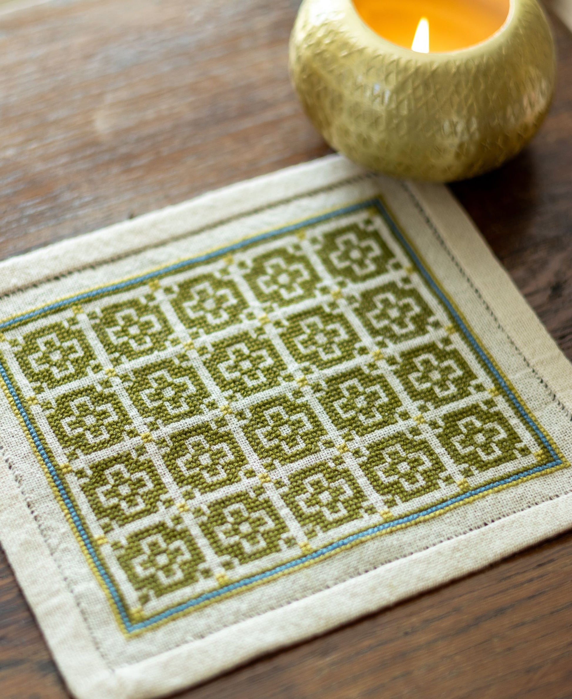 folk embroidery with green mosaic design