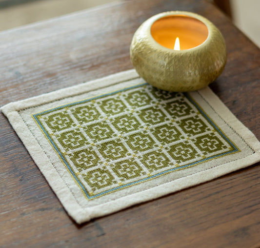 folk embroidery with green mosaic design