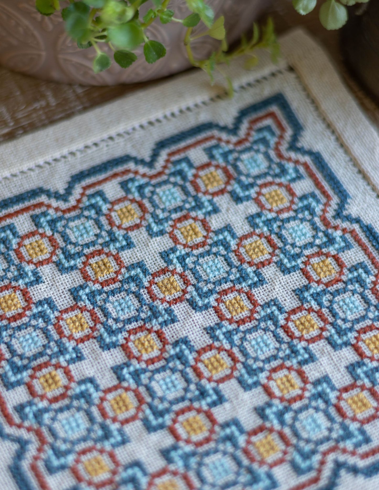 greek folk embroidery with repeating tile design