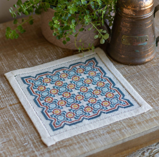 greek folk embroidery with repeating tile design