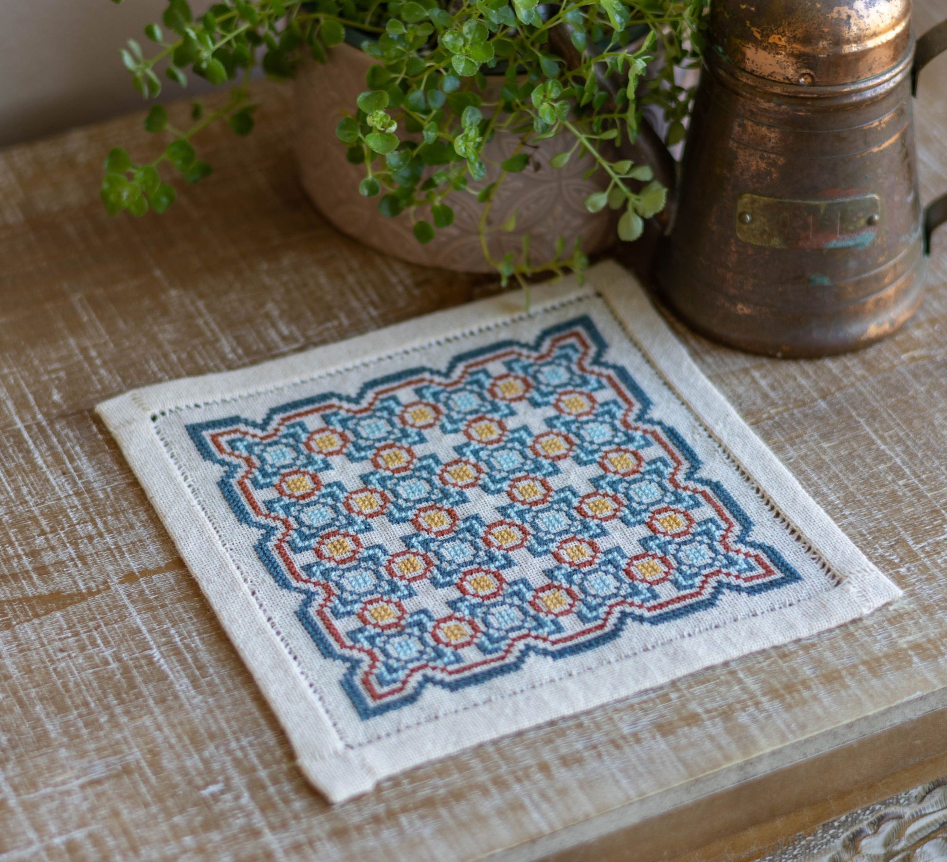 greek folk embroidery with repeating tile design