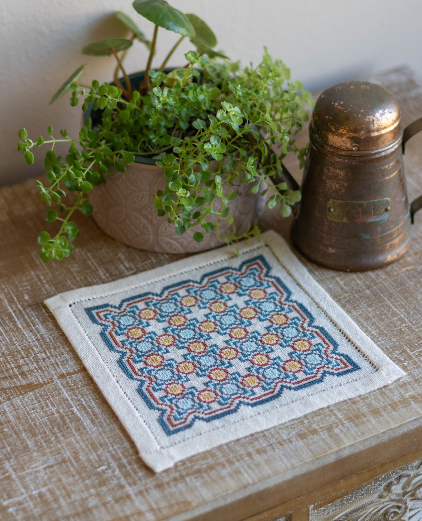 greek folk embroidery with repeating tile design