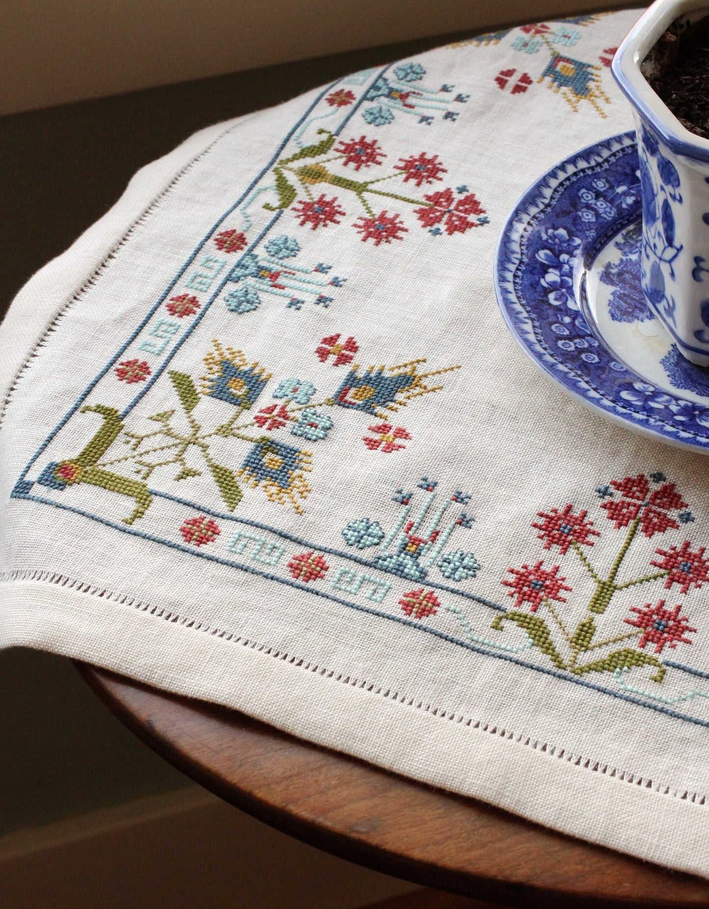 folk embroidery with blue floral design