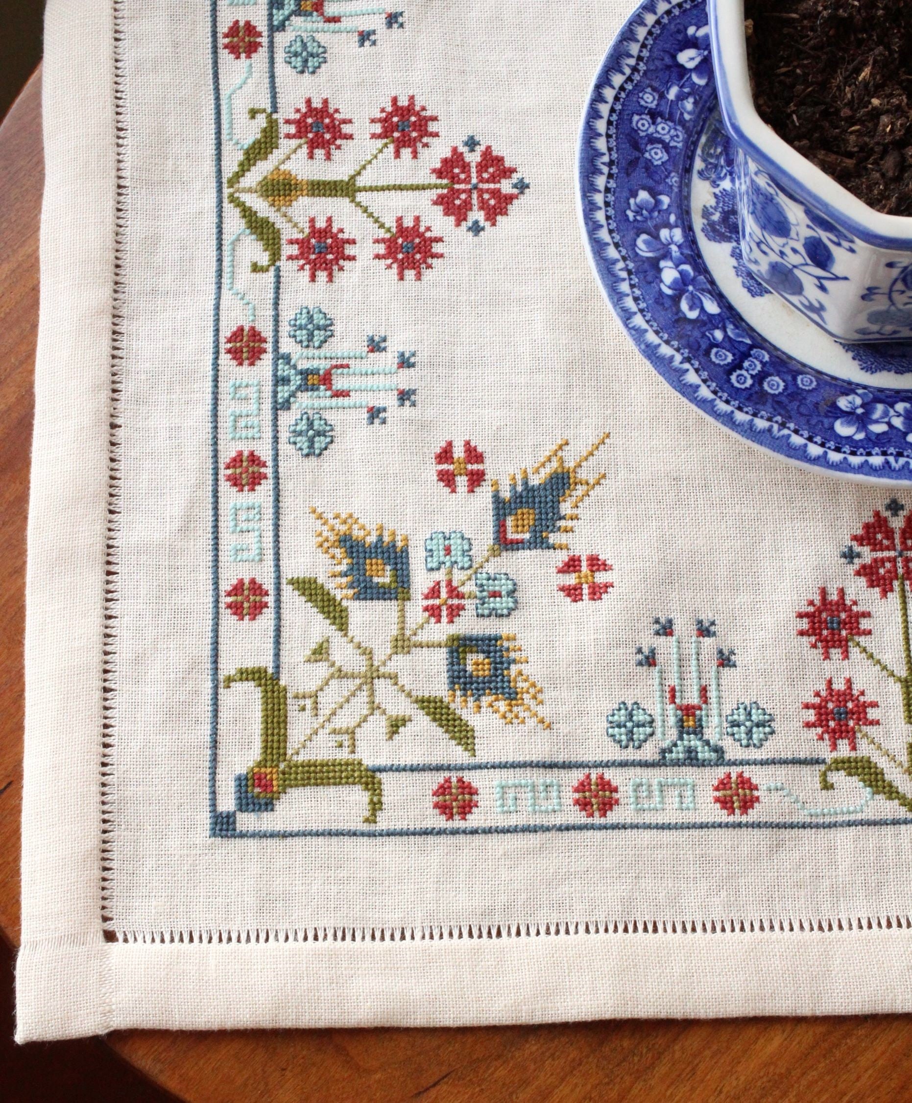 folk embroidery with blue floral design