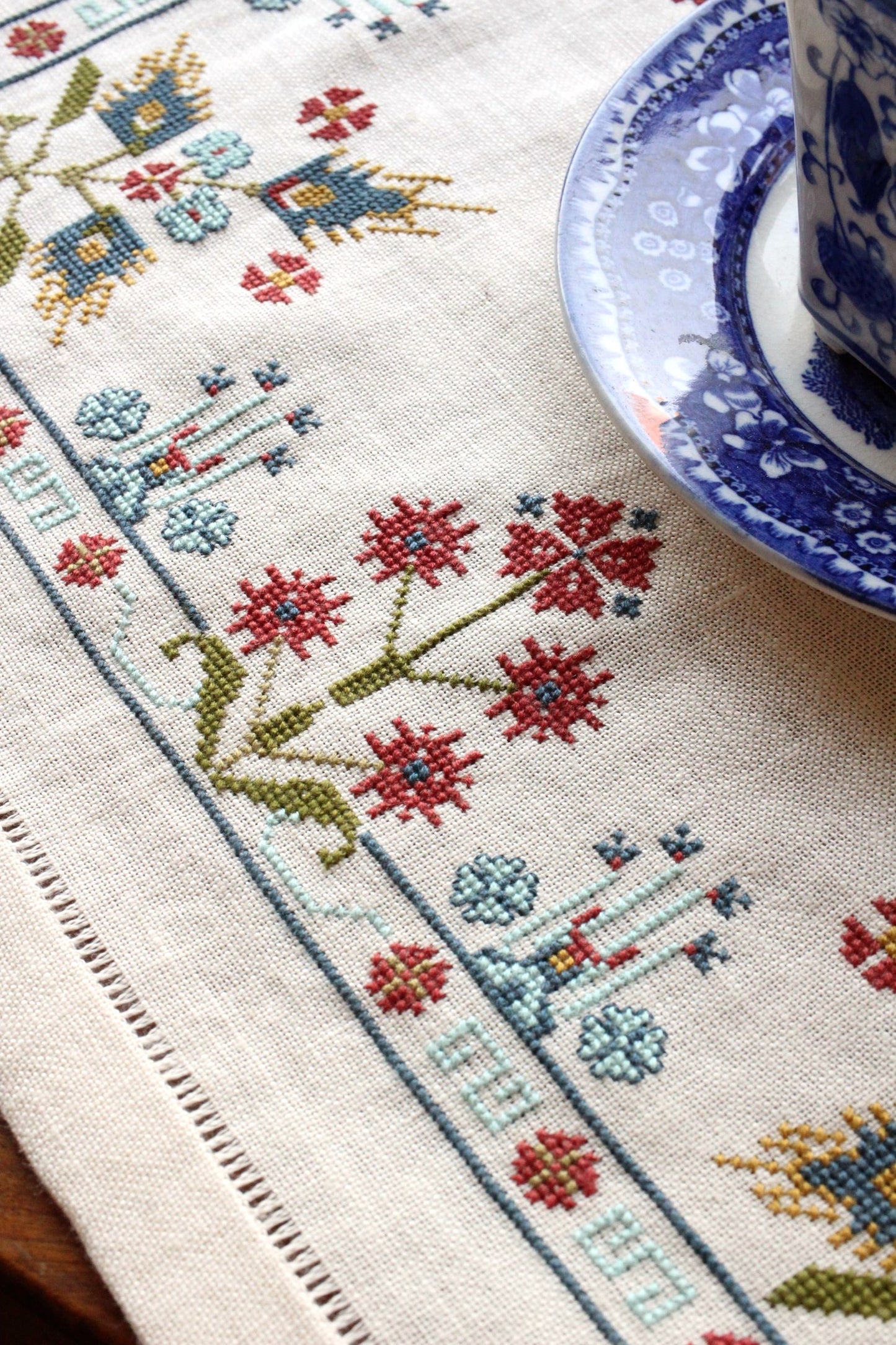 folk embroidery with blue floral design