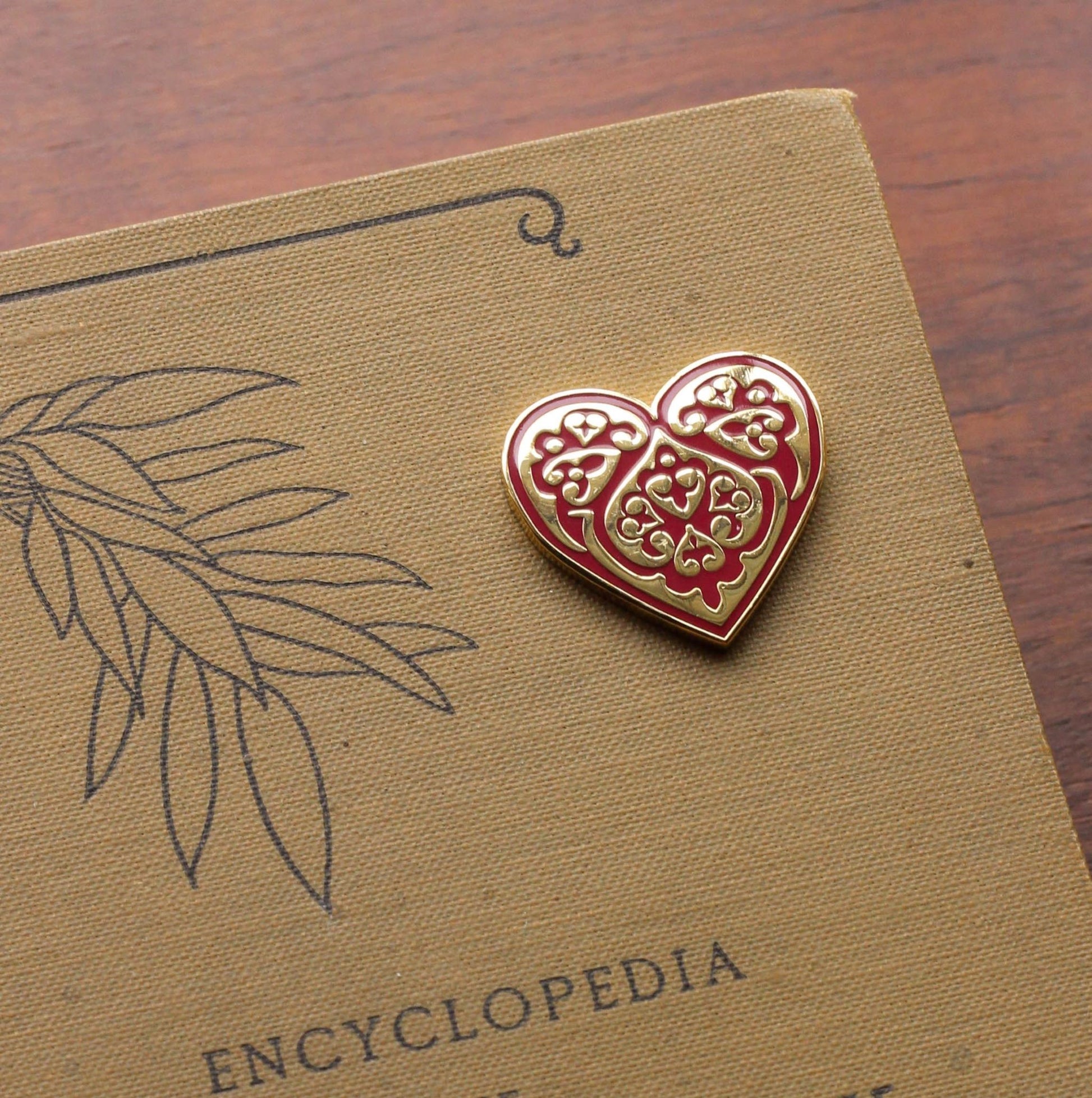 enamel needleminder in shape of heart