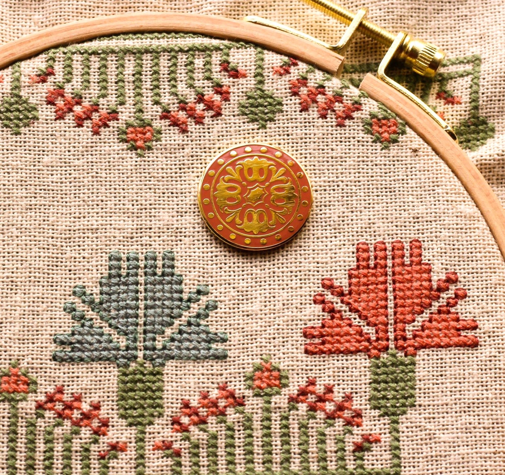 folk embroidery with needleminder with tulip design in coral