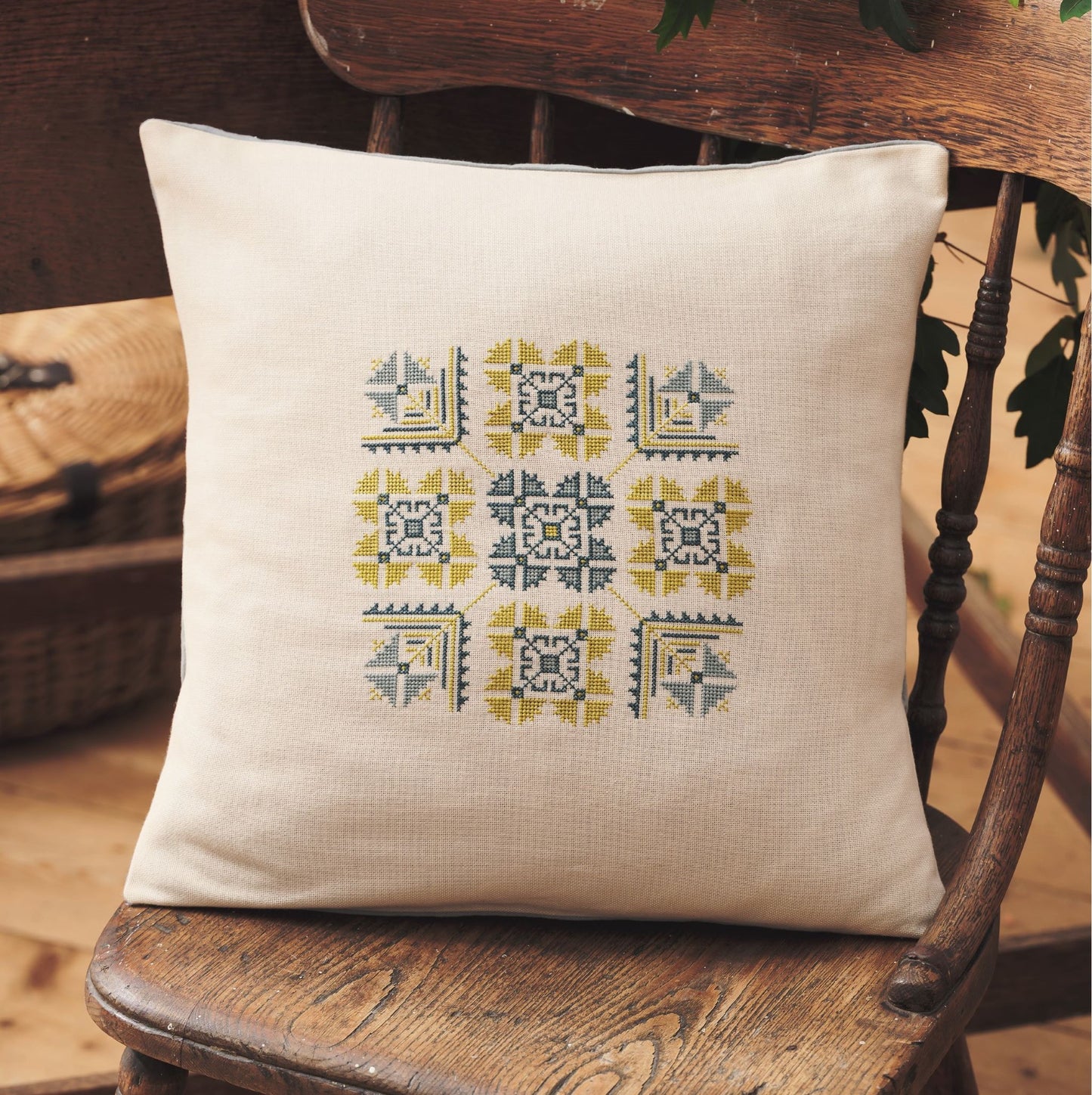 folk embroidery project with gold and blue design cushion from everyday folk book