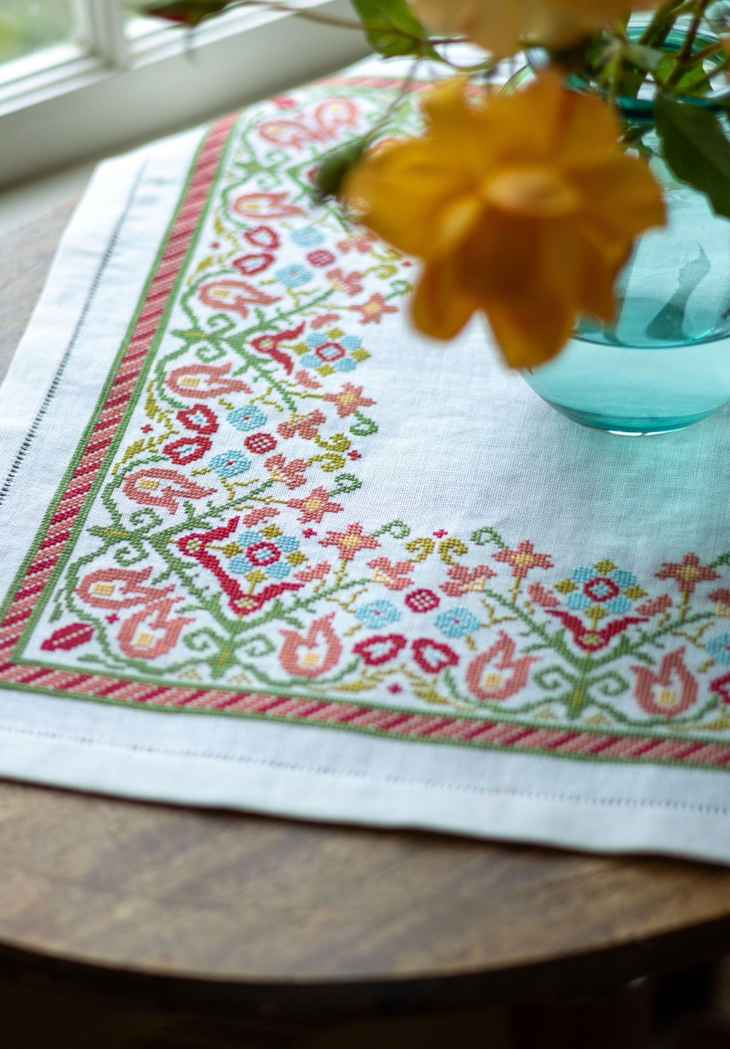 folk embroidery with multi colored floral border