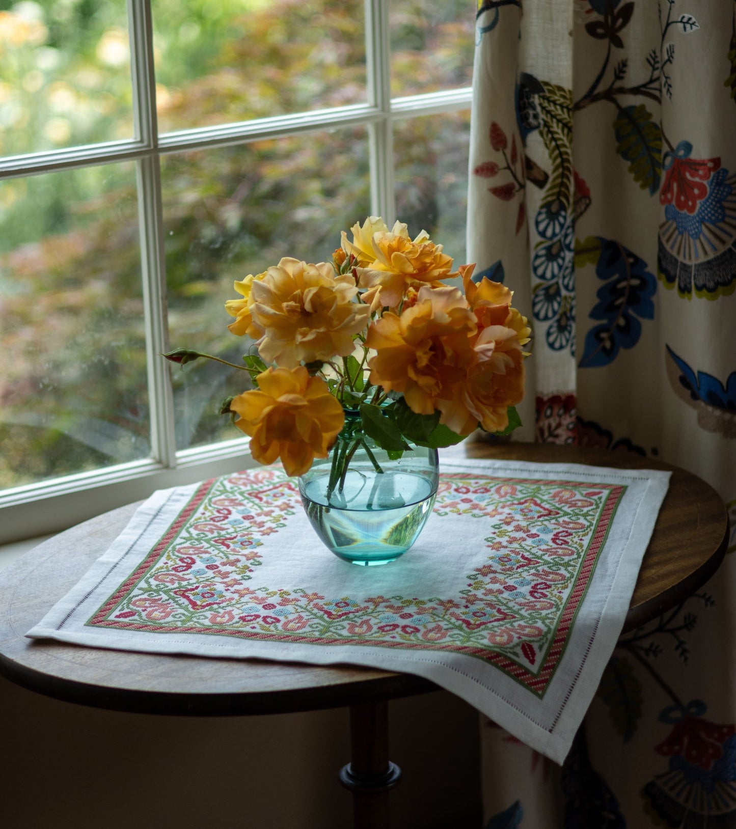 folk embroidery with multi colored floral border