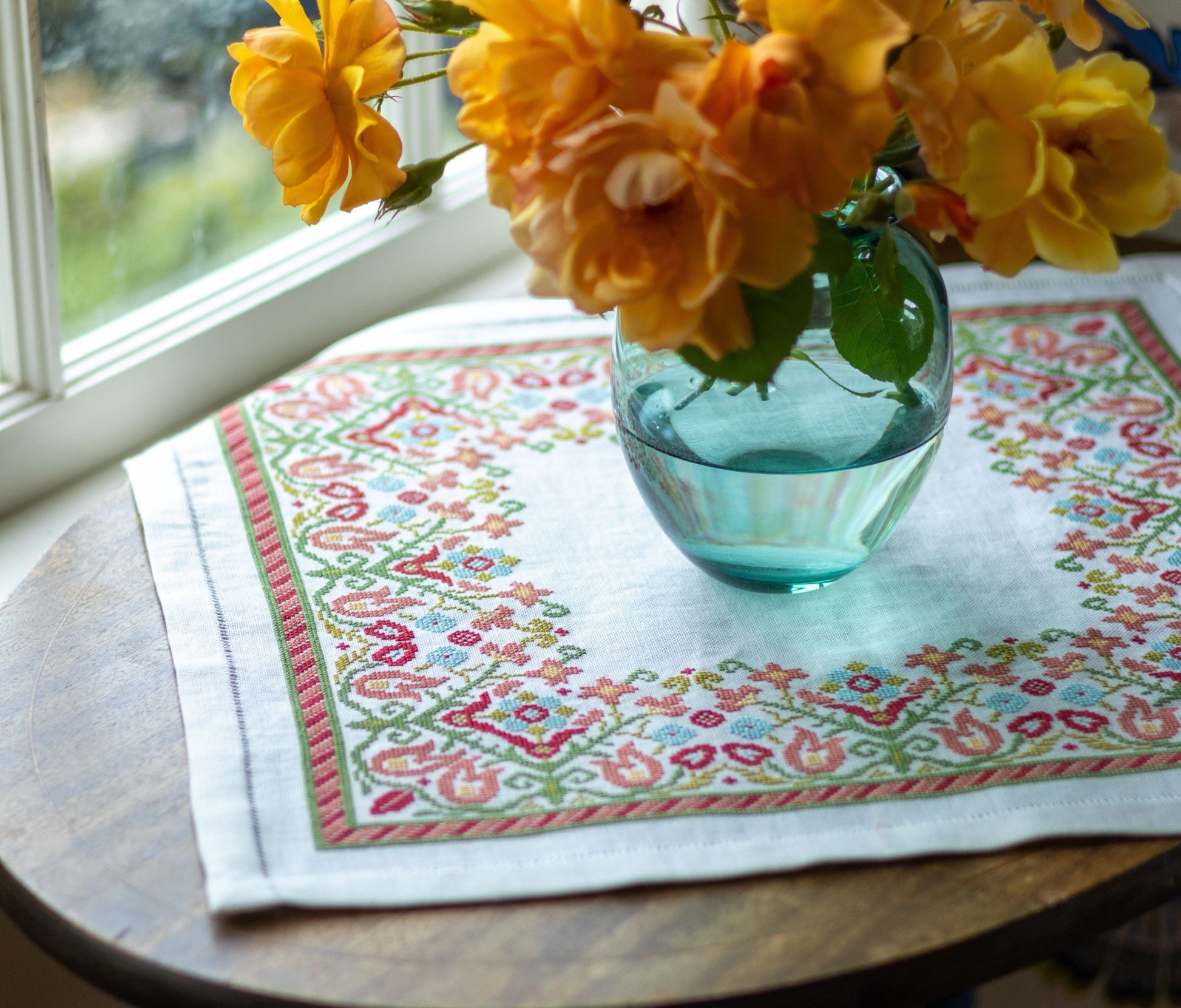 folk embroidery with multi colored floral border