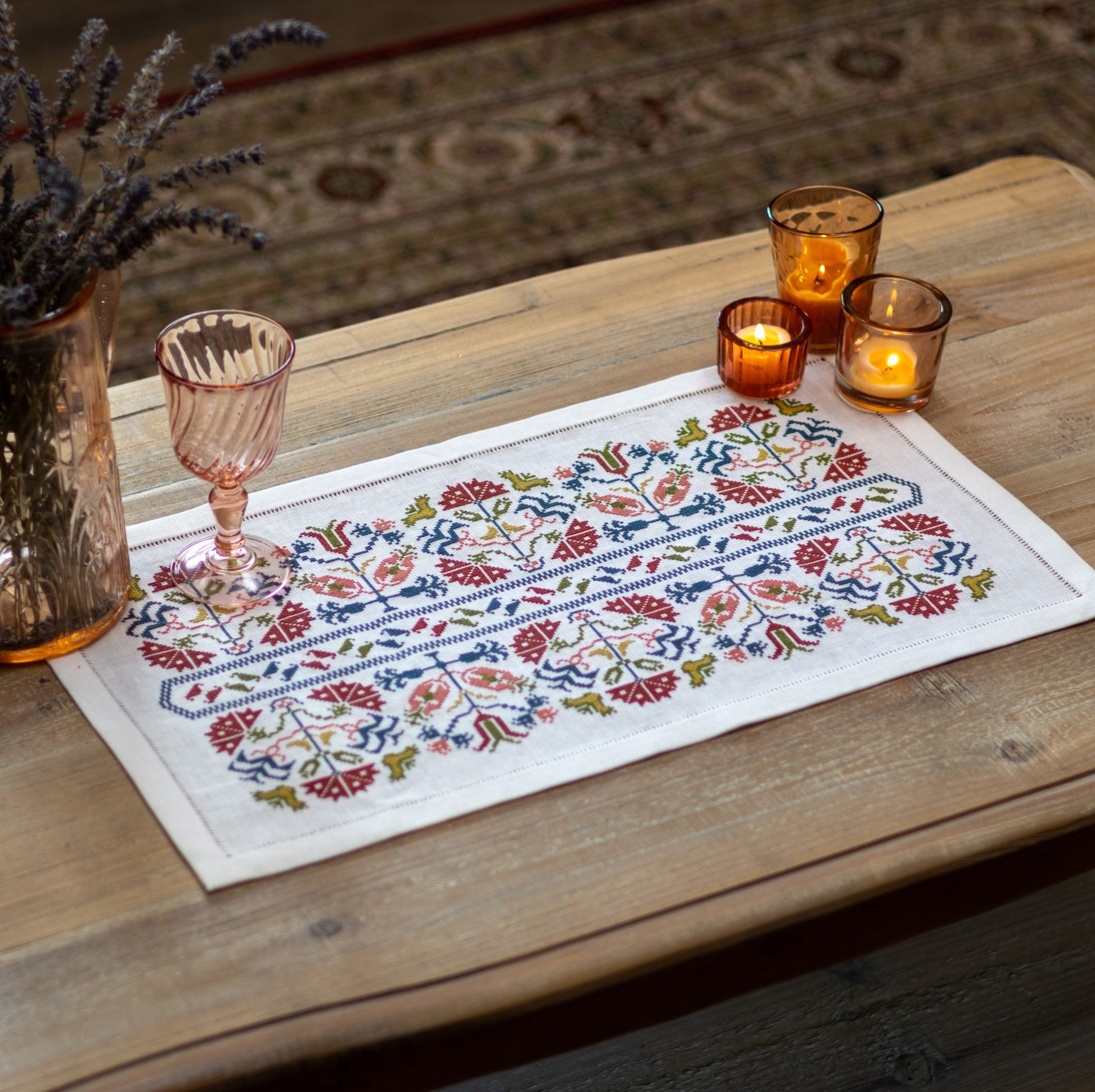 Greek cross stitch folk embroidery on linen with flower design with candles