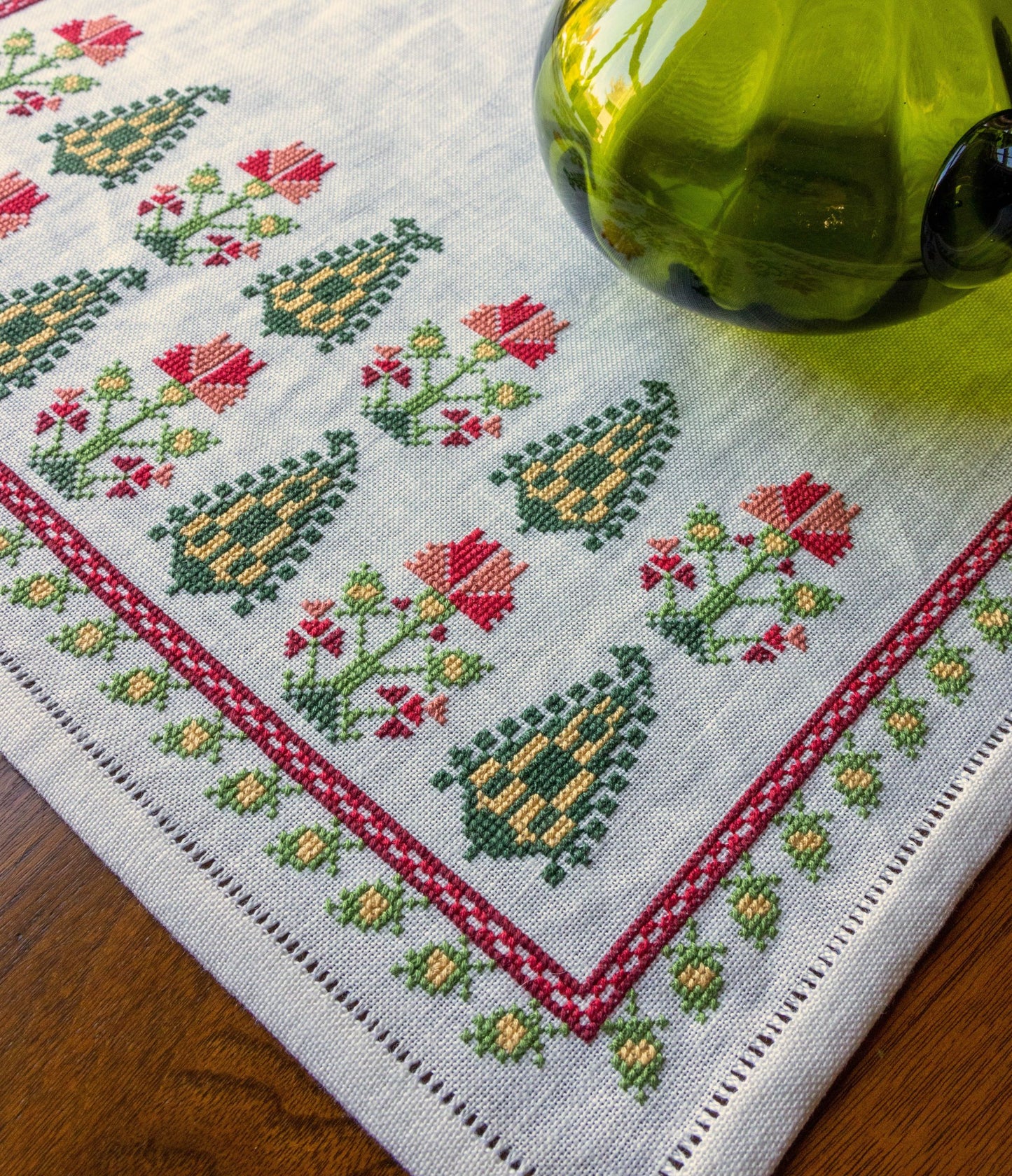 folk embroidery table runner with cypress trees and flowers