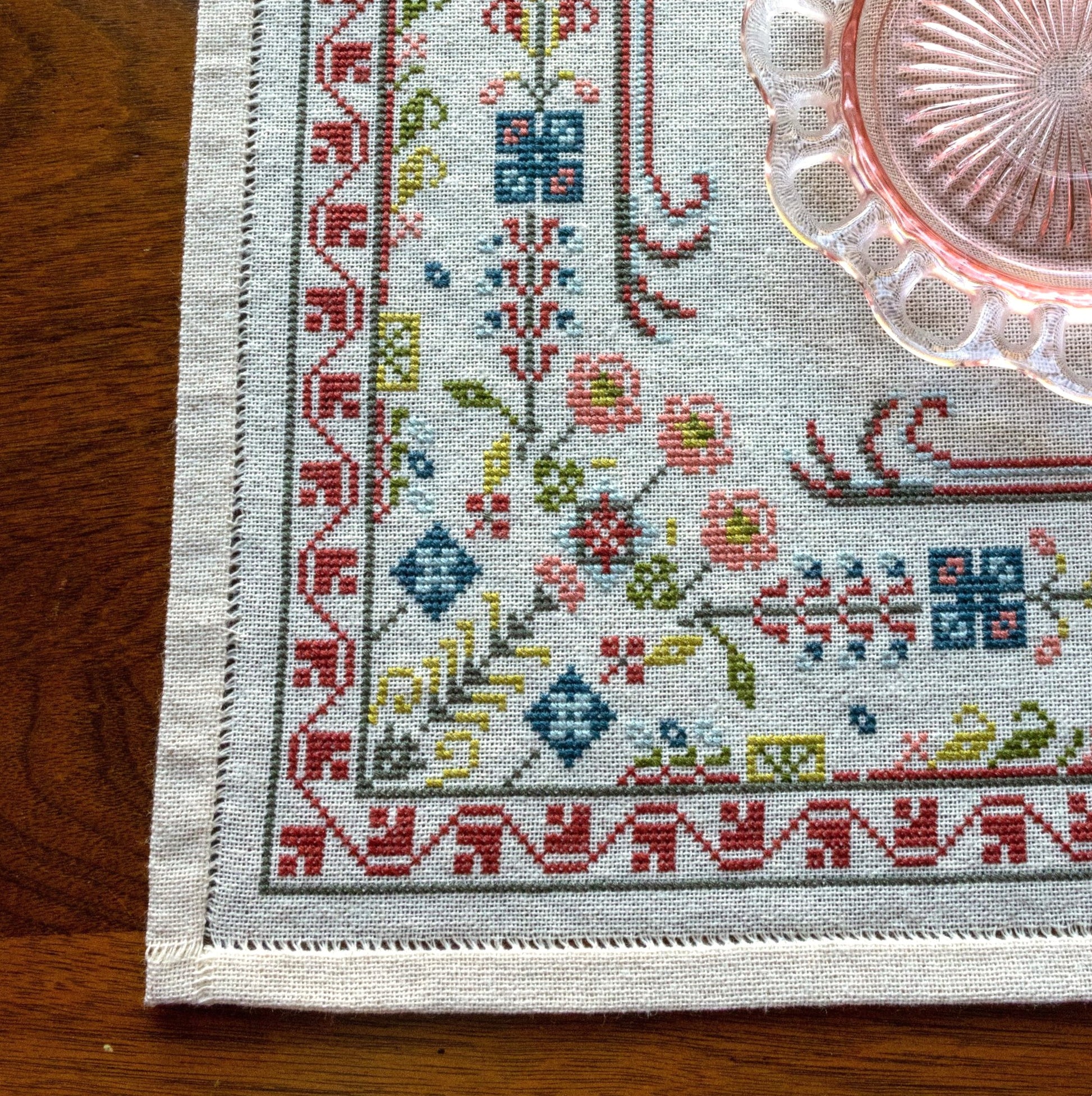 folk embroidery with floral border design