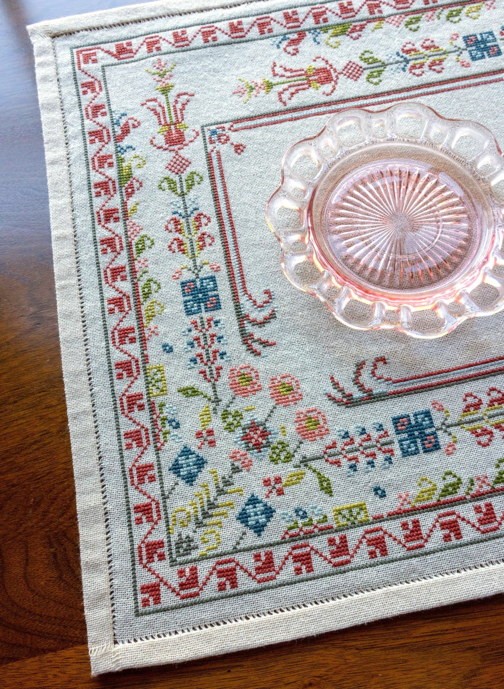 folk embroidery with floral border design