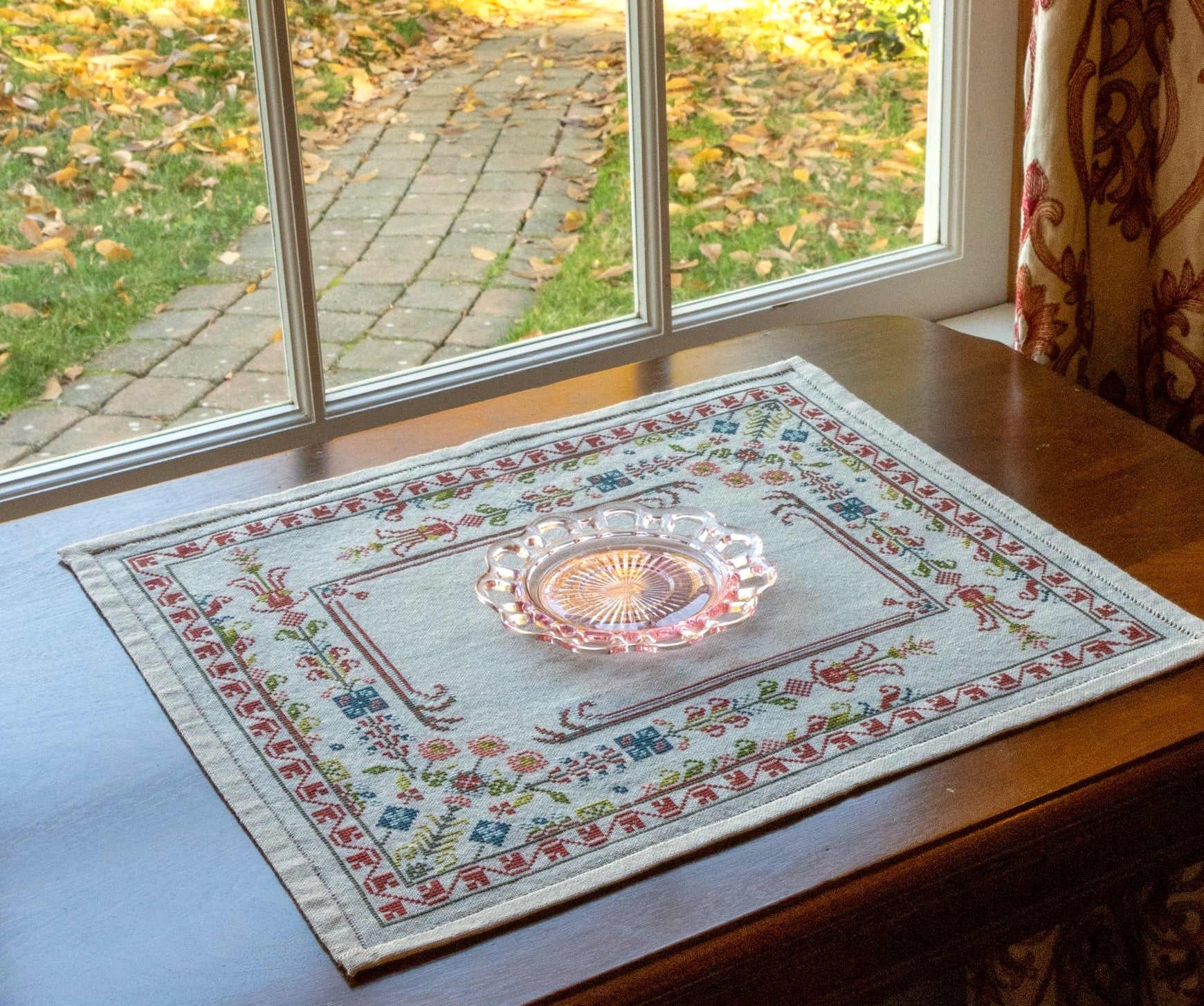 folk embroidery with floral border design
