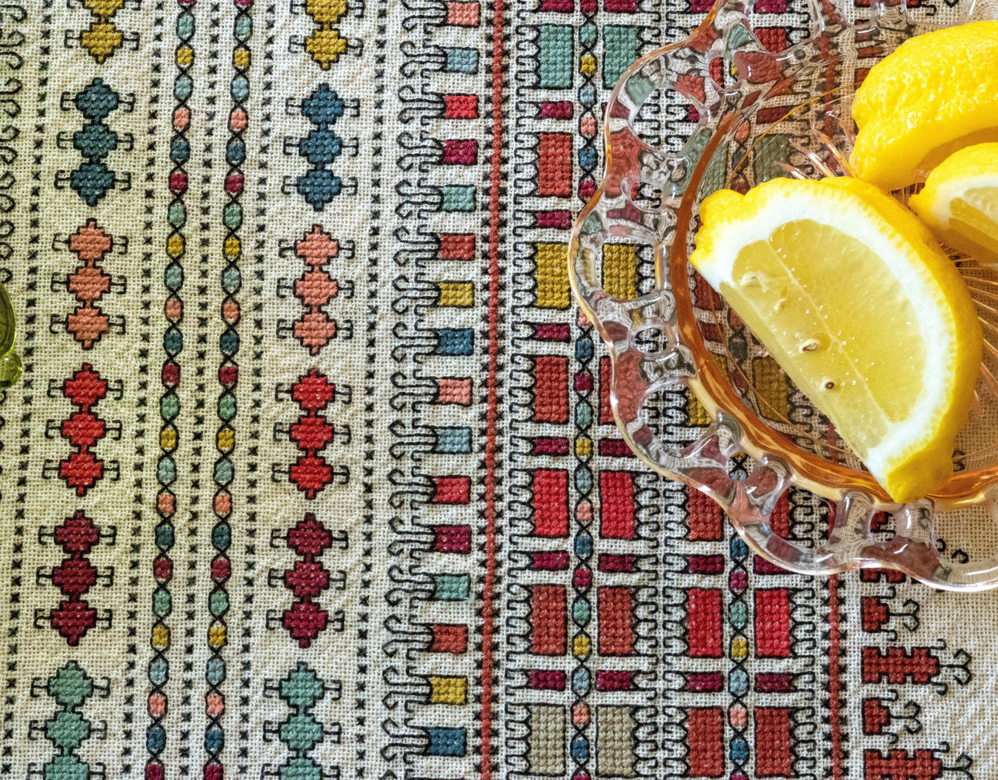 folk embroidery table runner with geometric pattern