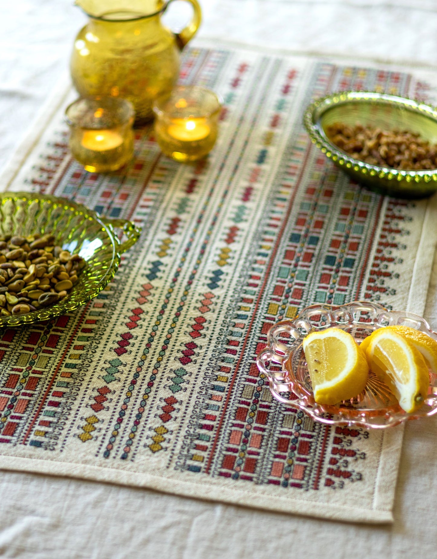 folk embroidery table runner with geometric pattern