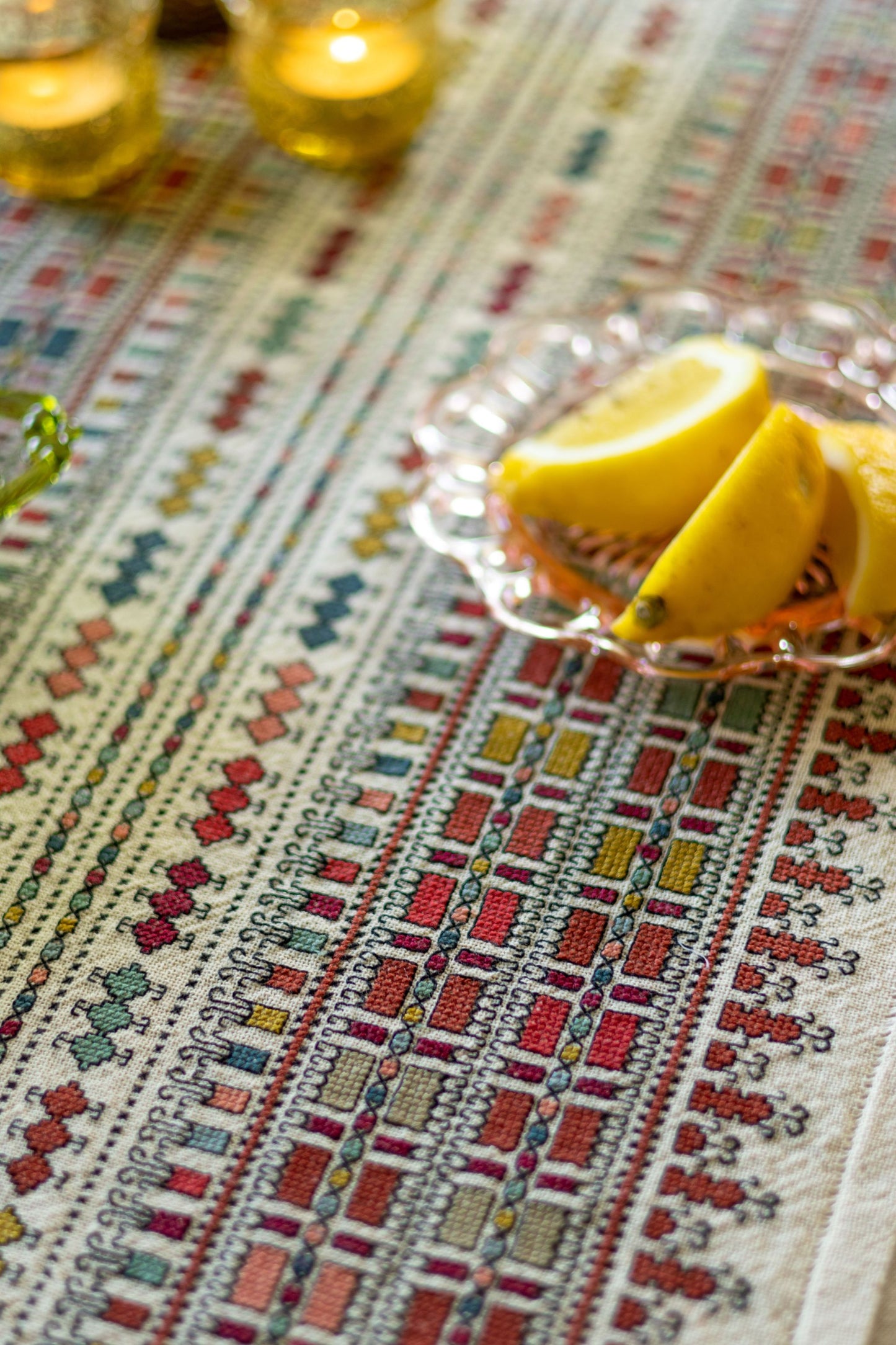 folk embroidery table runner with geometric pattern