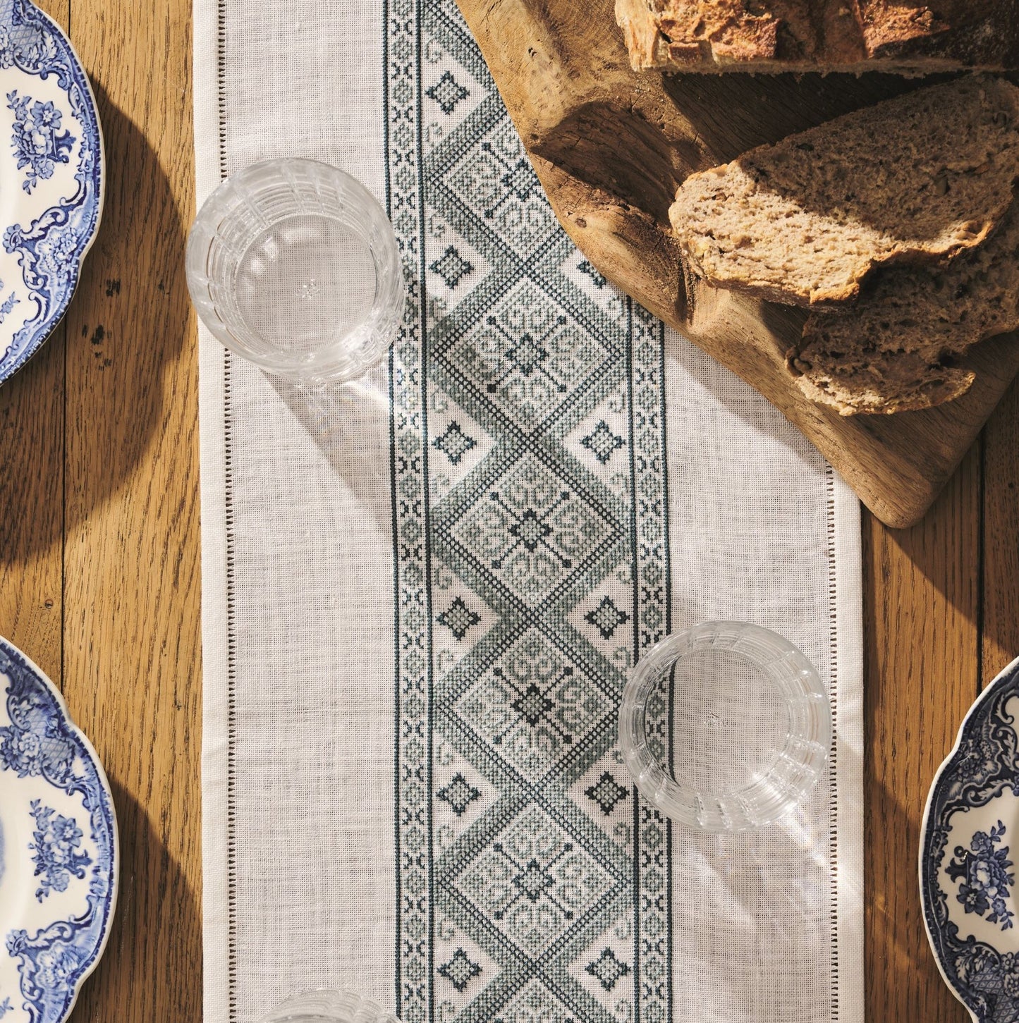 folk embroidery table runner with blue diamond design from everyday folk book