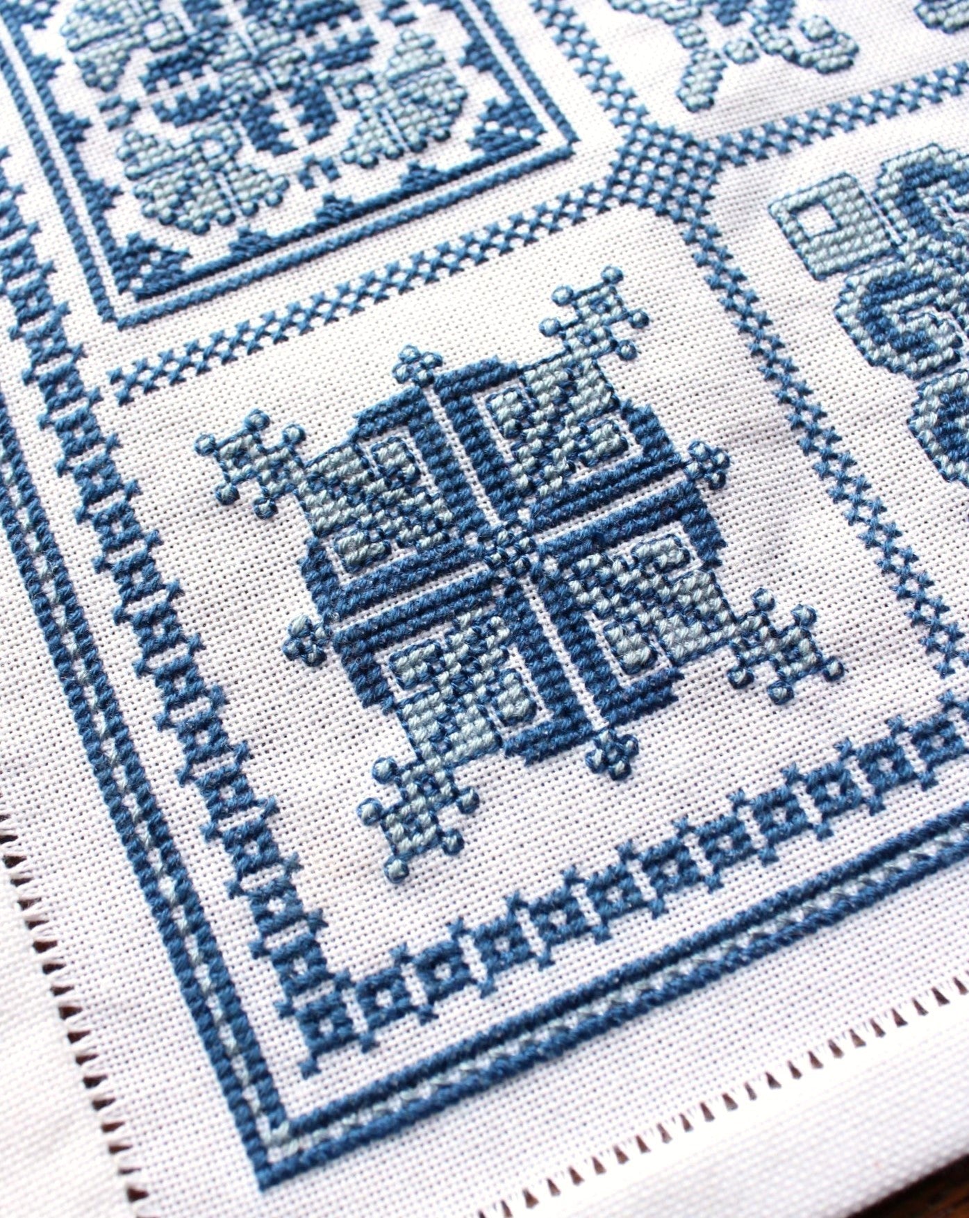 folk embroidery sampler with Mediterranean motifs