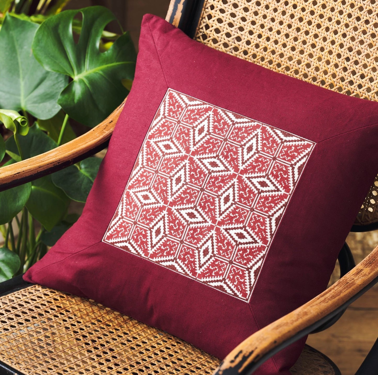 folk embroidery cushion with red star design from everyday folk book