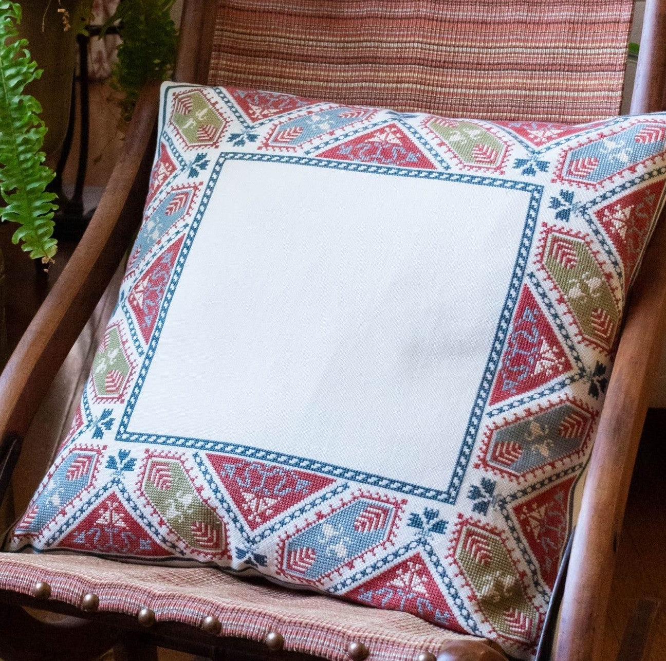 greek folk embroidery cushion with leaf design