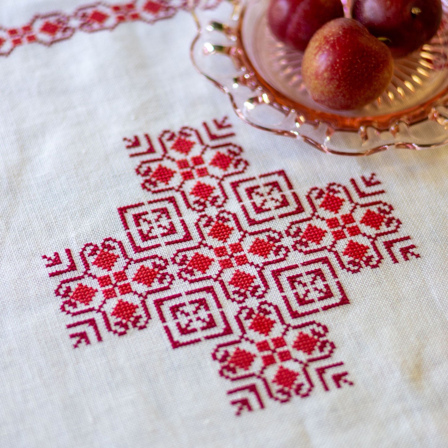 basket cloth with red folk embroidery design