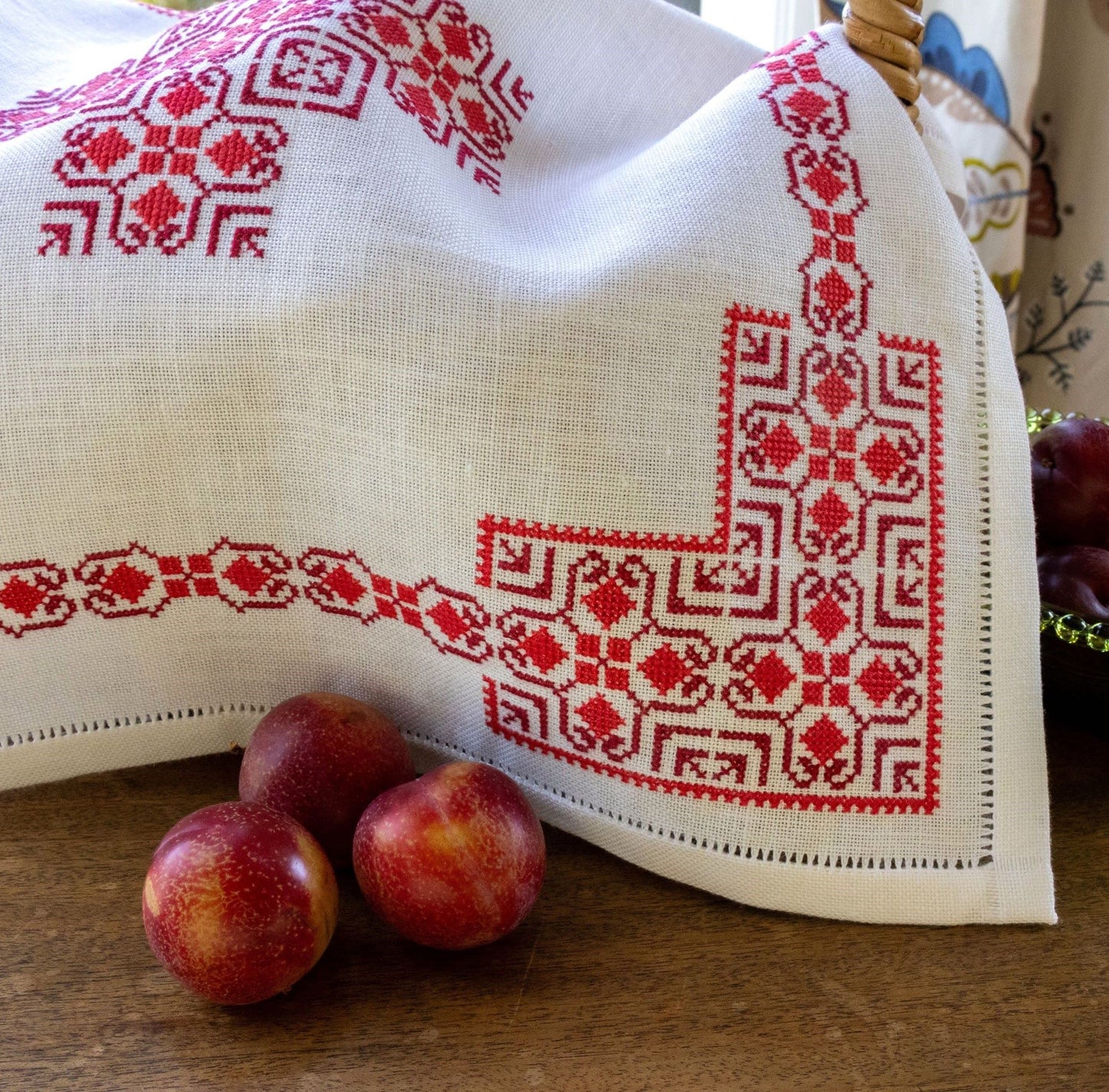 basket cloth with red folk embroidery design