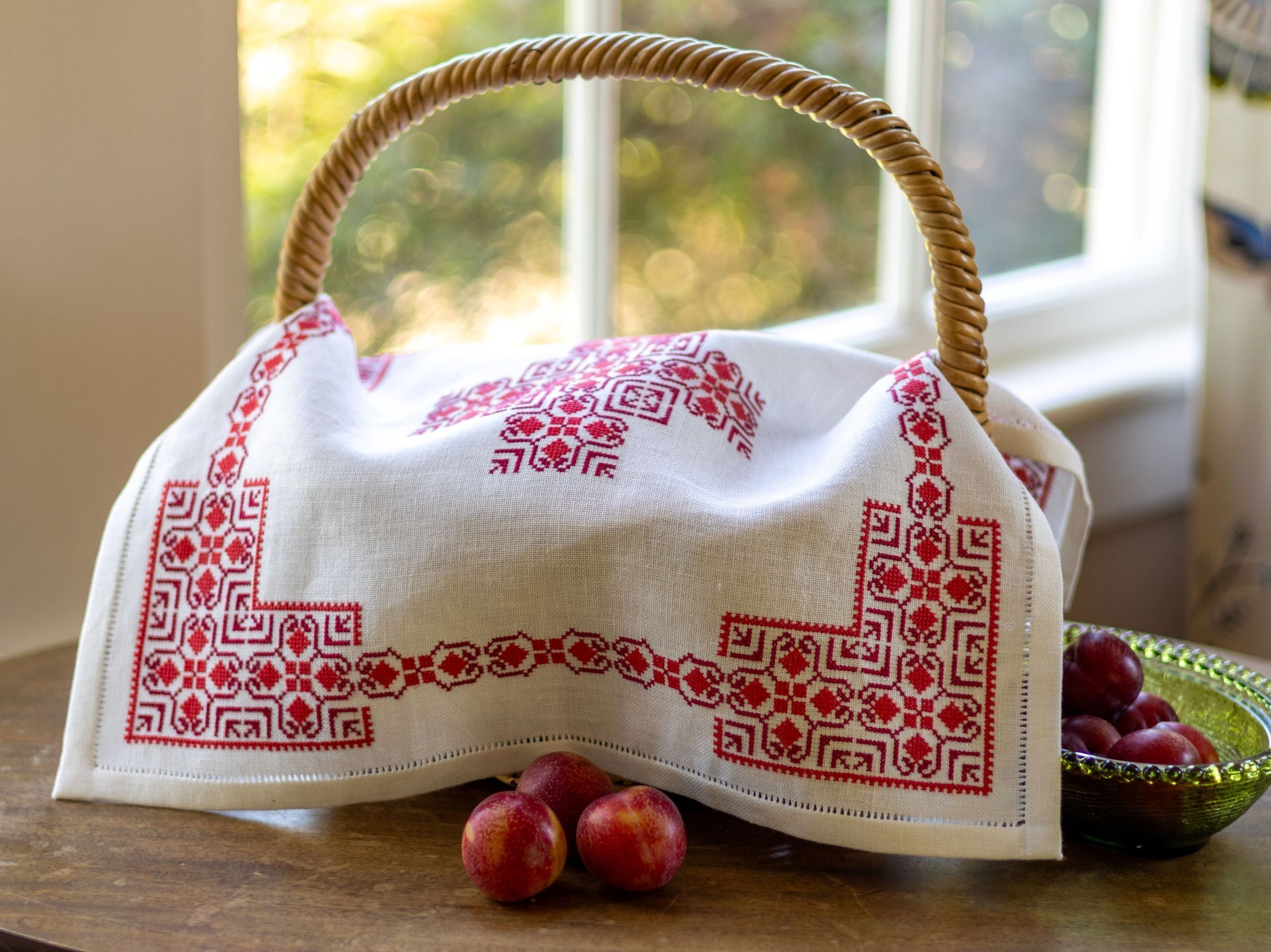 basket cloth with red folk embroidery design