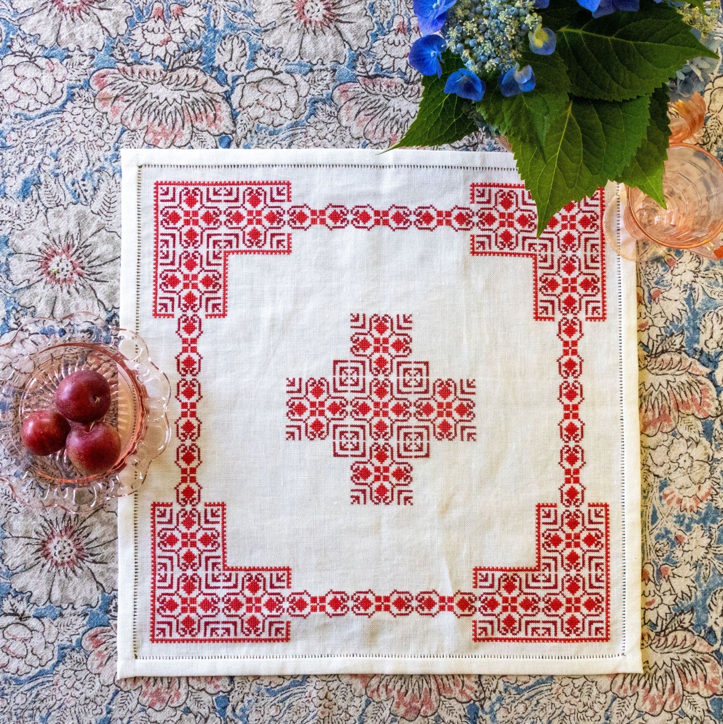 basket cloth with red folk embroidery design