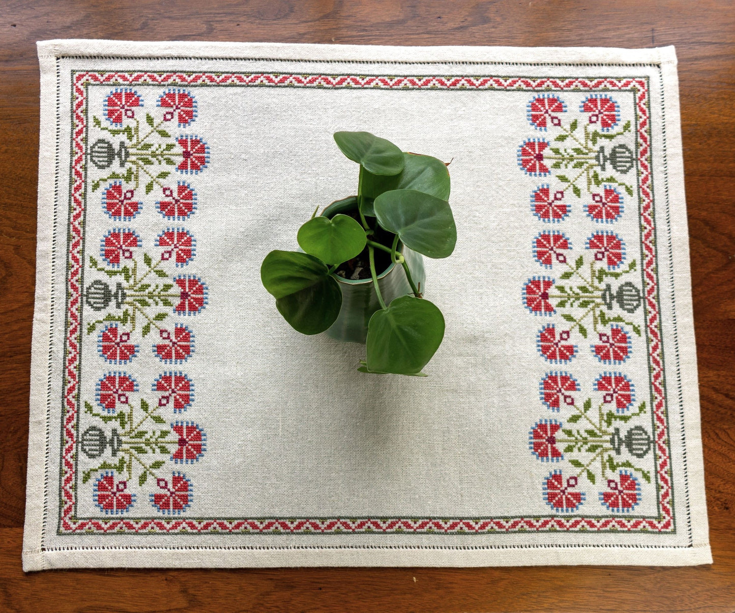 cross stitch folk embroidery with red poppy design