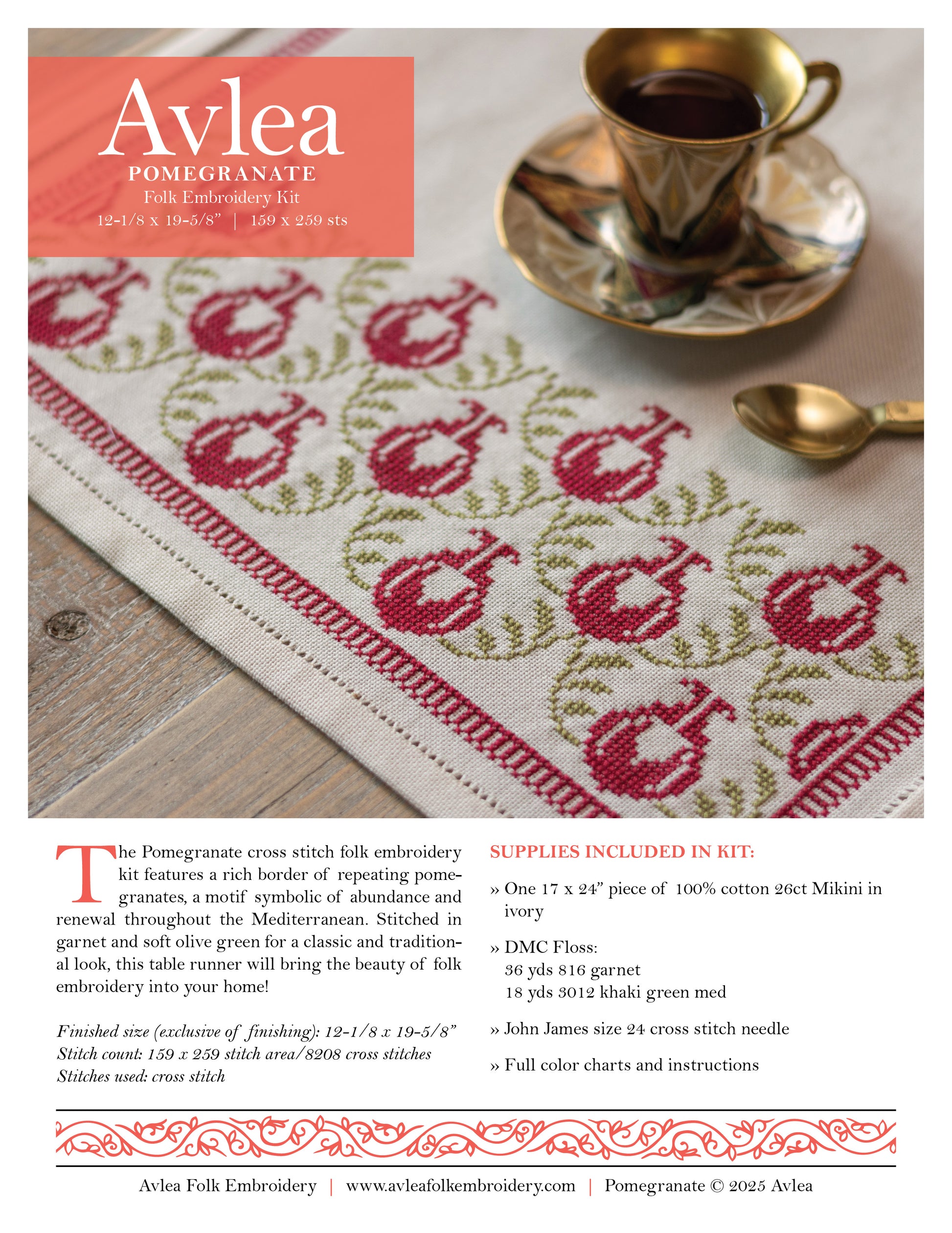 Avlea Folk Embroidery Pomegranate table runner with cross-stitch pattern on a wooden surface.