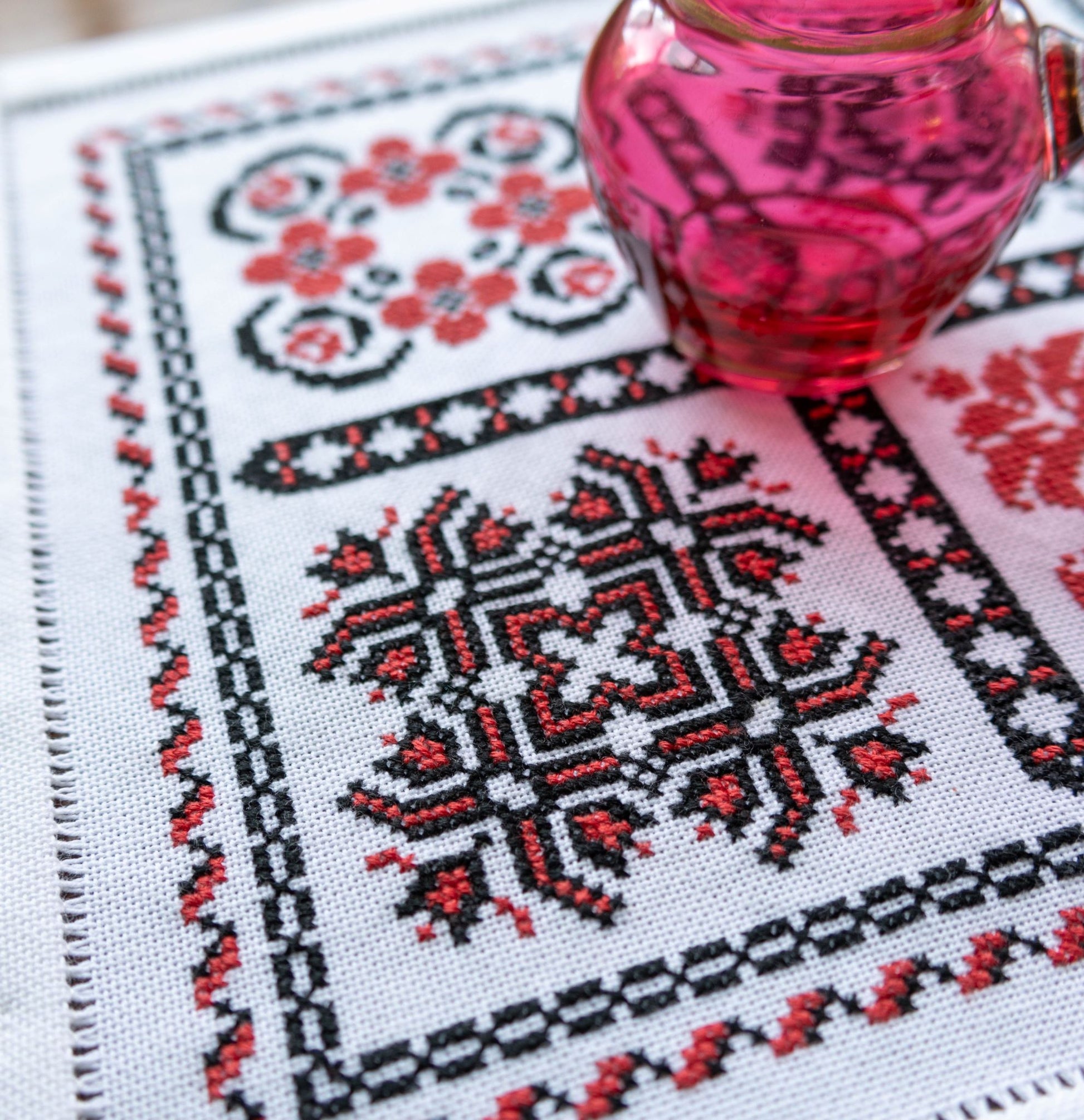 cross stitch folk embroidery with romanian motifs